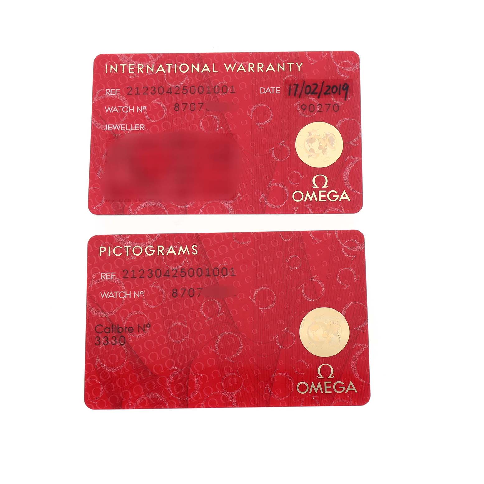 The image shows the international warranty and pictograms cards for an Omega Seamaster 212.30.42.50.01.001 Men's Stainless Steel Black Dial watch.