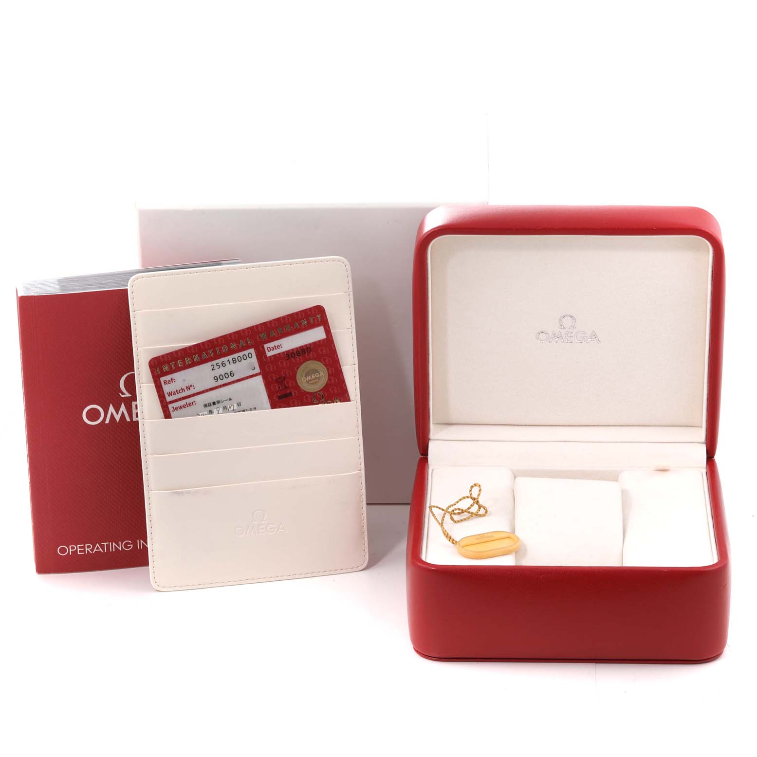 The image shows the packaging, warranty cards, and an operating instruction manual for the Omega Seamaster 2561.80.00 Men's Stainless Steel Blue Dial 2561.80.00 Men's Stainless Steel Blue Dial watch.