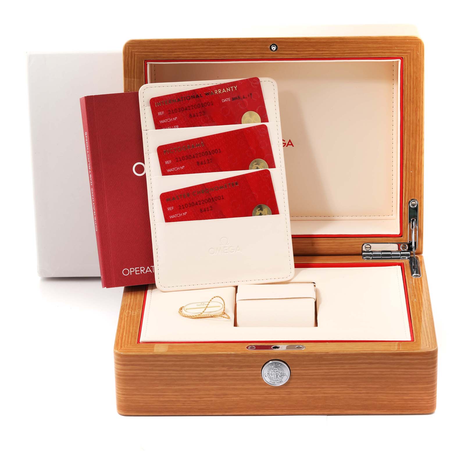 The image shows the packaging and accessories of an Omega Seamaster 210.30.42.20.01.001 Men
s Stainless Steel Black Dial 210.30.42.20.01.001 Men
s Stainless Steel Black Dial watch, including the warranty cards, manual, and wooden box.