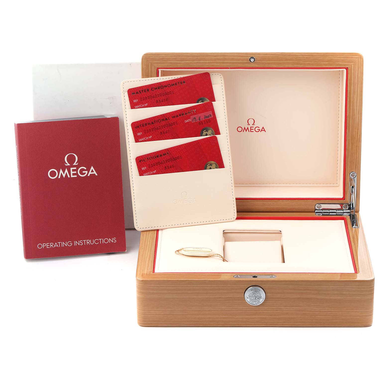 The image shows the Omega Seamaster 210.30.42.20.03.001 Men
s Stainless Steel Blue Dial 210.30.42.20.03.001 Men
s Stainless Steel Blue Dial watch box with operating instructions, warranty cards, and a loop.