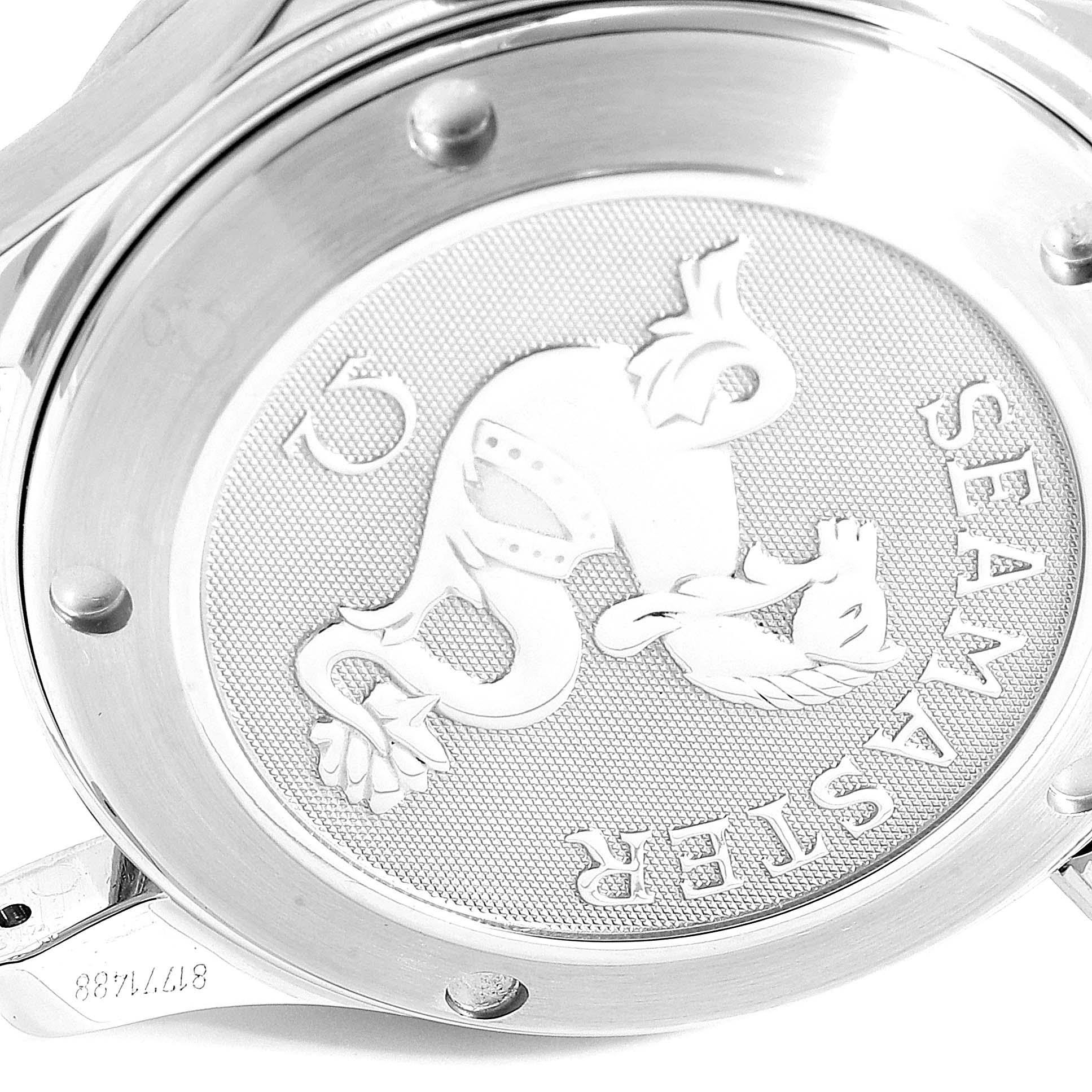 The image shows a close-up view of the case back of an Omega Seamaster 2222.80.00 Men
s Stainless Steel Blue Dial 2222.80.00 Men
s Stainless Steel Blue Dial watch, including its emblem and engraving.