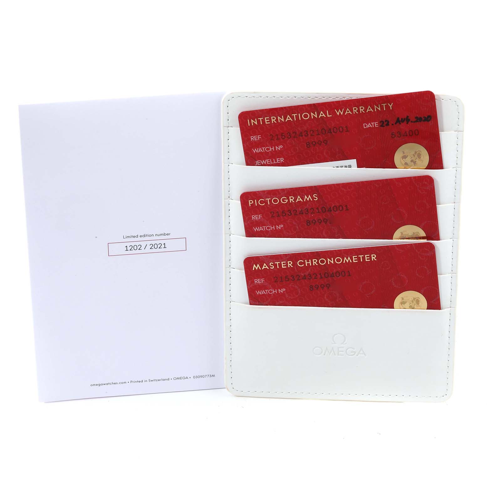 The image shows warranty and certification cards in a holder for the Omega Planet Ocean 215.32.43.21.04.001 Men's Stainless Steel White Dial 215.32.43.21.04.001 Men's Stainless Steel White Dial model watch.