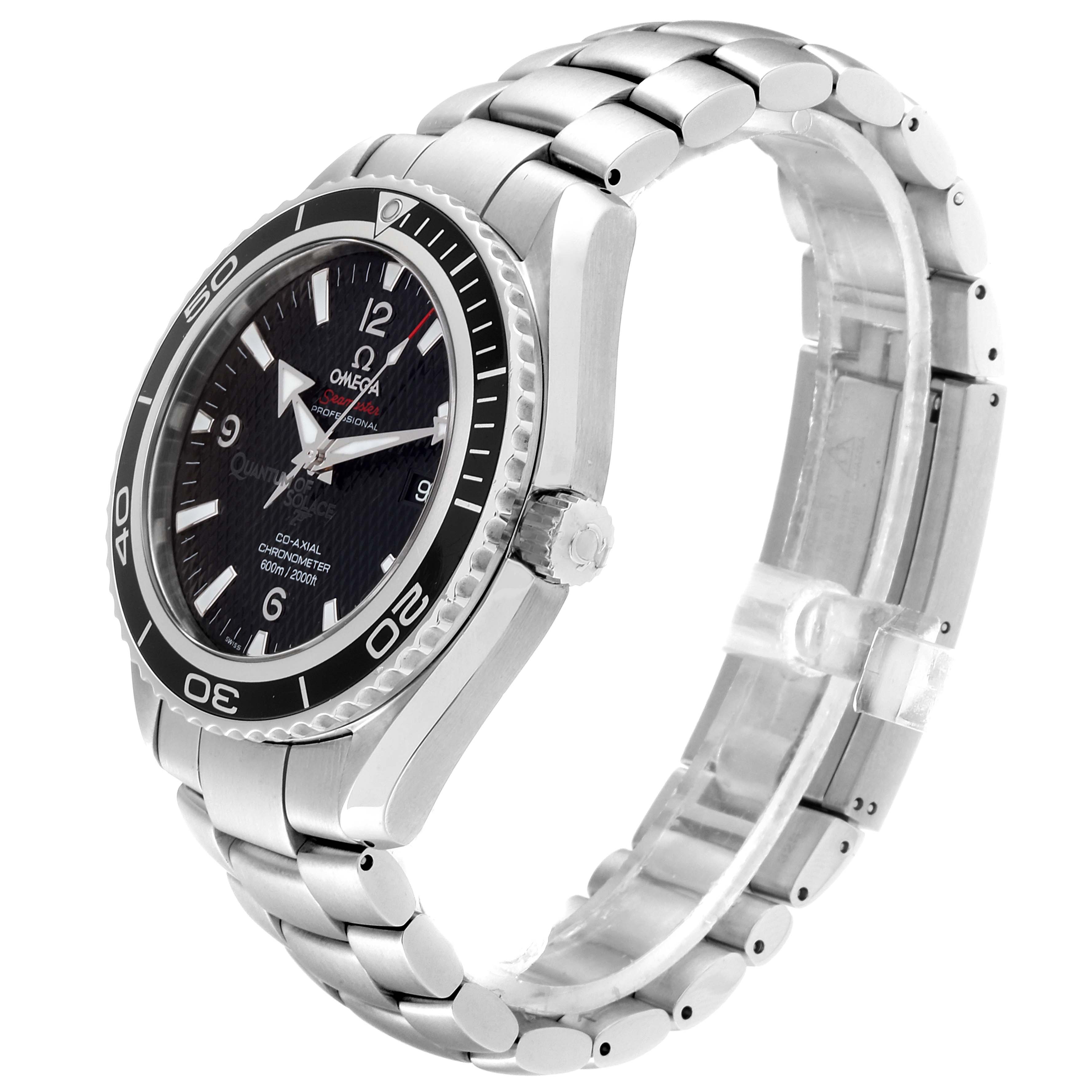 The image shows an angled side view of an Omega Planet Ocean 222.30.46.20.01.001 Men
s Stainless Steel Black Dial 222.30.46.20.01.001 Men
s Stainless Steel Black Dial watch, highlighting the face, bezel, crown, and metal bracelet.