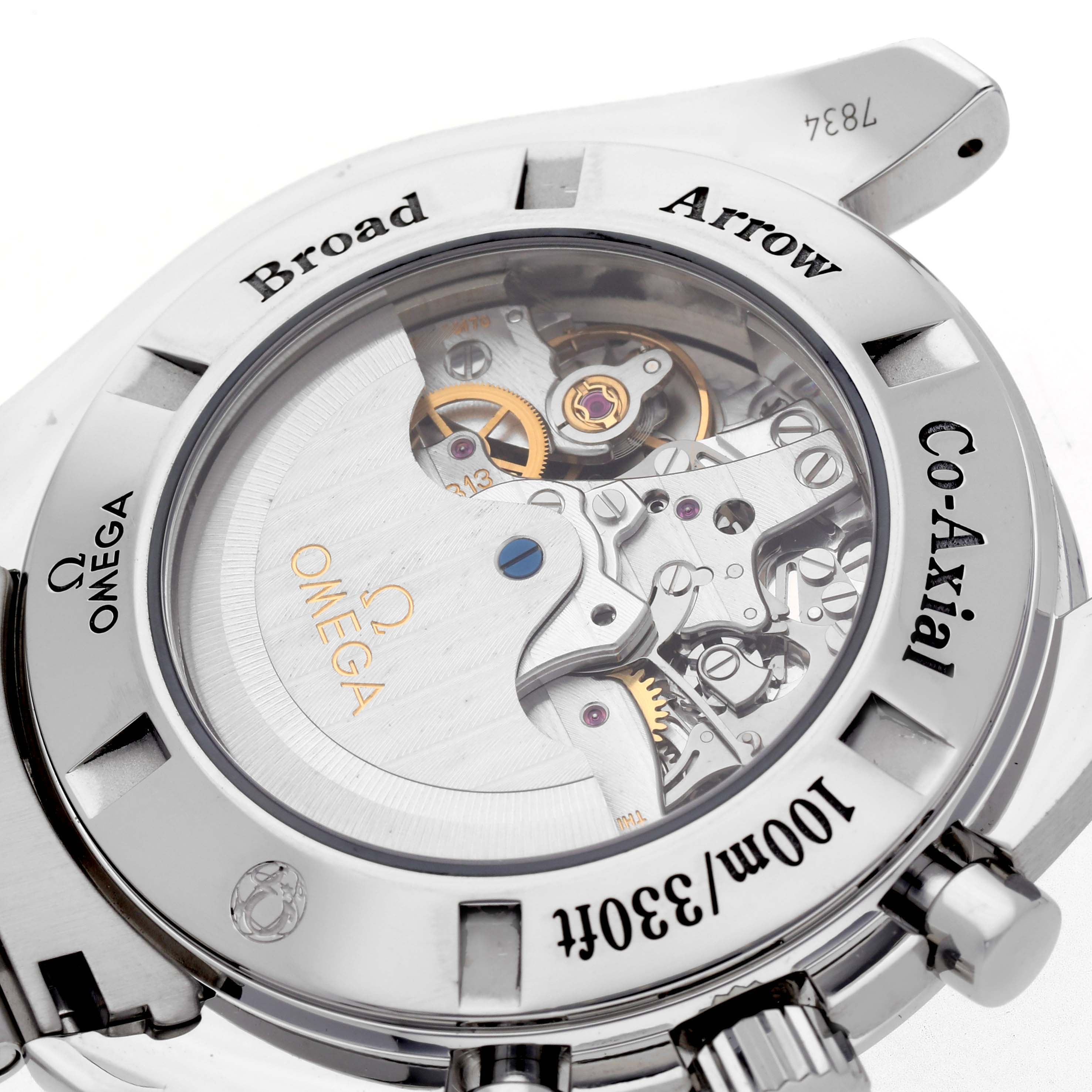 The image shows the back of the Omega Speedmaster 321.10.44.50.01.001 Men
s Stainless Steel Black Dial 321.10.44.50.01.001 Men
s Stainless Steel Black Dial Broad Arrow, highlighting its visible mechanical movement through a transparent caseback.