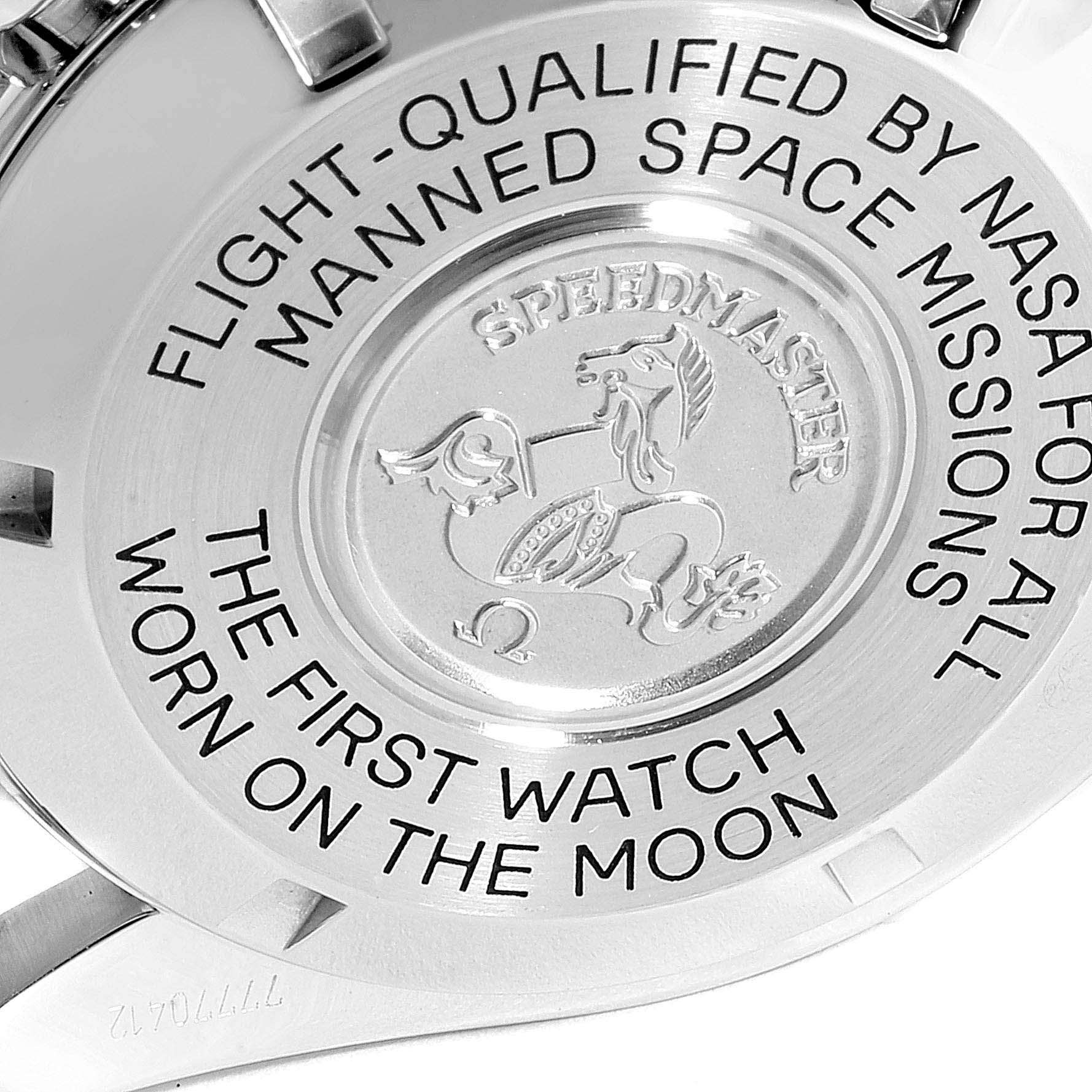 The image shows the case back of an Omega Speedmaster 3570.50.00 Men
s Stainless Steel Black Dial 3570.50.00 Men
s Stainless Steel Black Dial watch, featuring engravings about its NASA qualification and moon landing history.