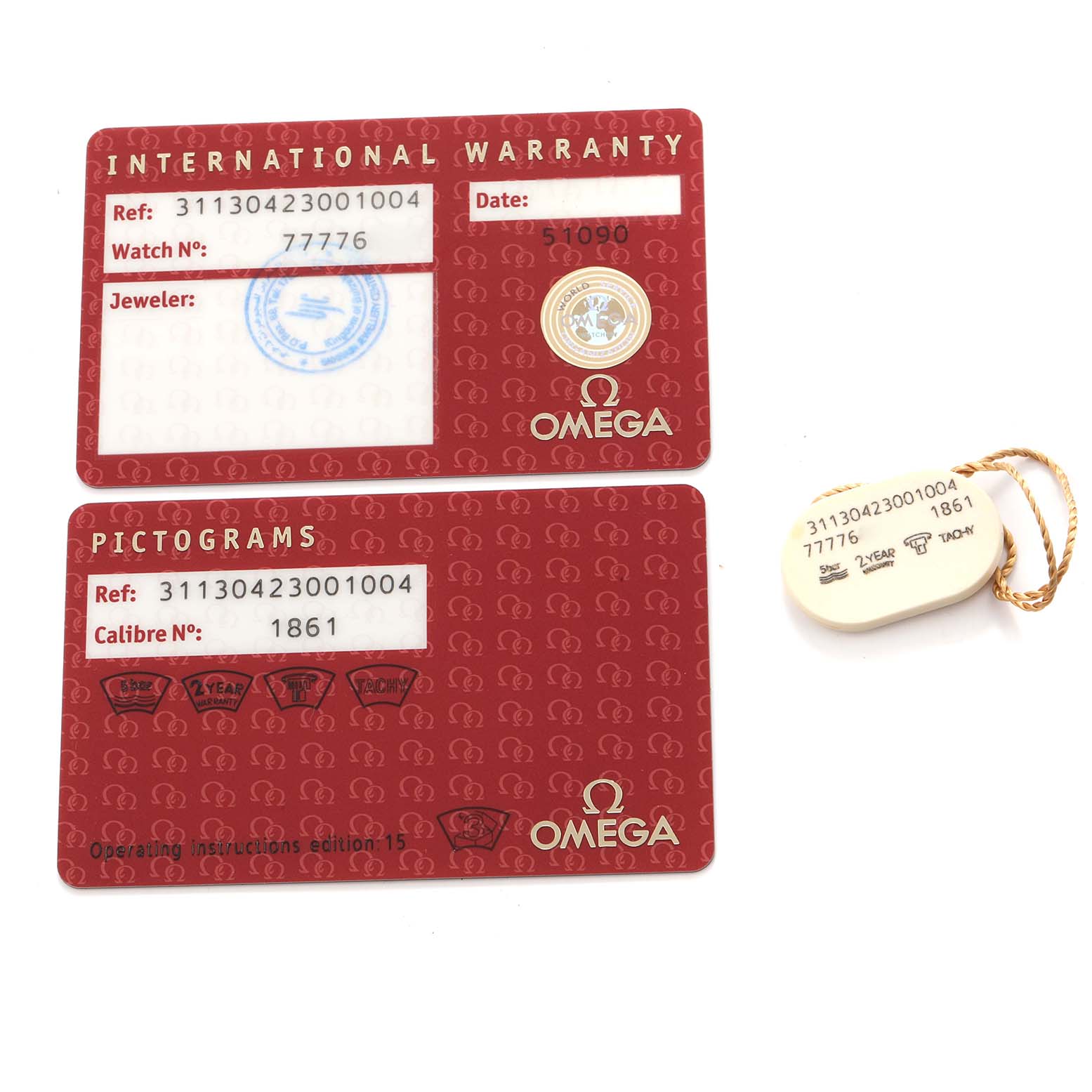 The image shows two Omega Speedmaster 311.30.42.30.01.004 Men
s Stainless Steel Black Dial 311.30.42.30.01.004 Men
s Stainless Steel Black Dial warranty and pictogram cards, and a tag with reference numbers.