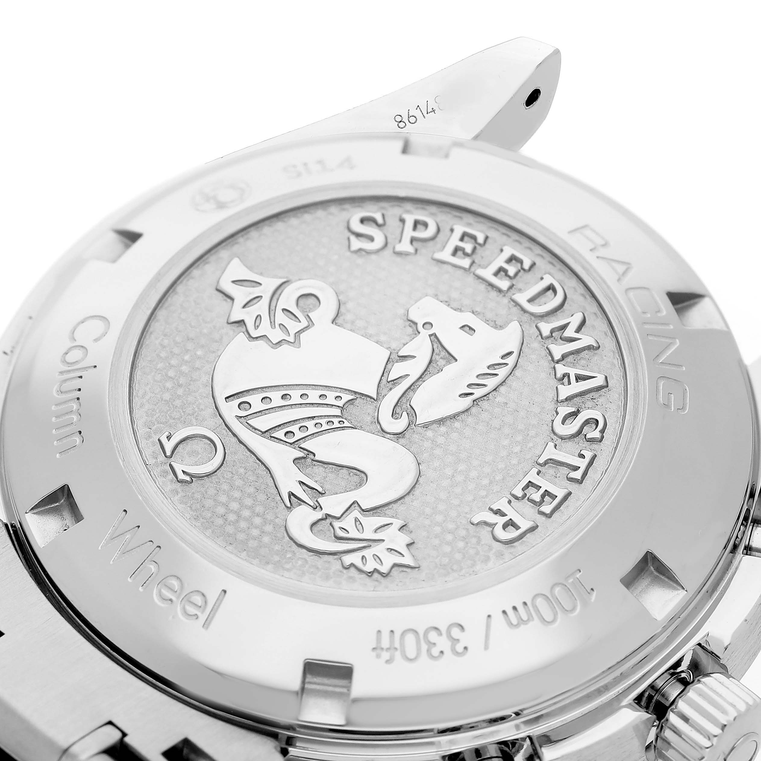 The image shows the case back of an Omega Speedmaster 326.30.40.50.04.001 Men's Stainless Steel White Dial, highlighting the embossed design and engraved details.