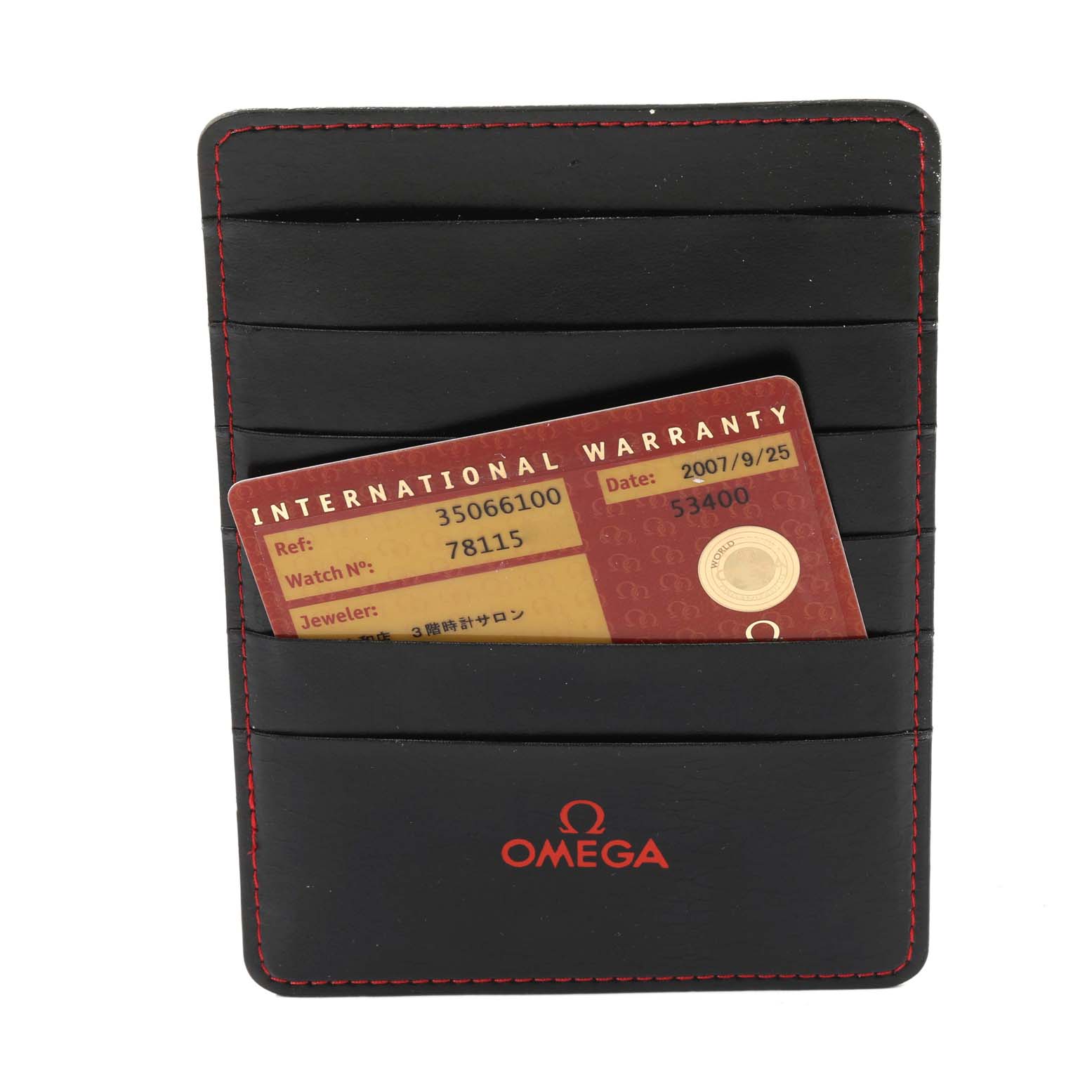 The image shows an Omega Speedmaster 3506.61.00 Men's Stainless Steel Red Dial 3506.61.00 Men's Stainless Steel Red Dial international warranty card in a black Omega cardholder with red stitching.