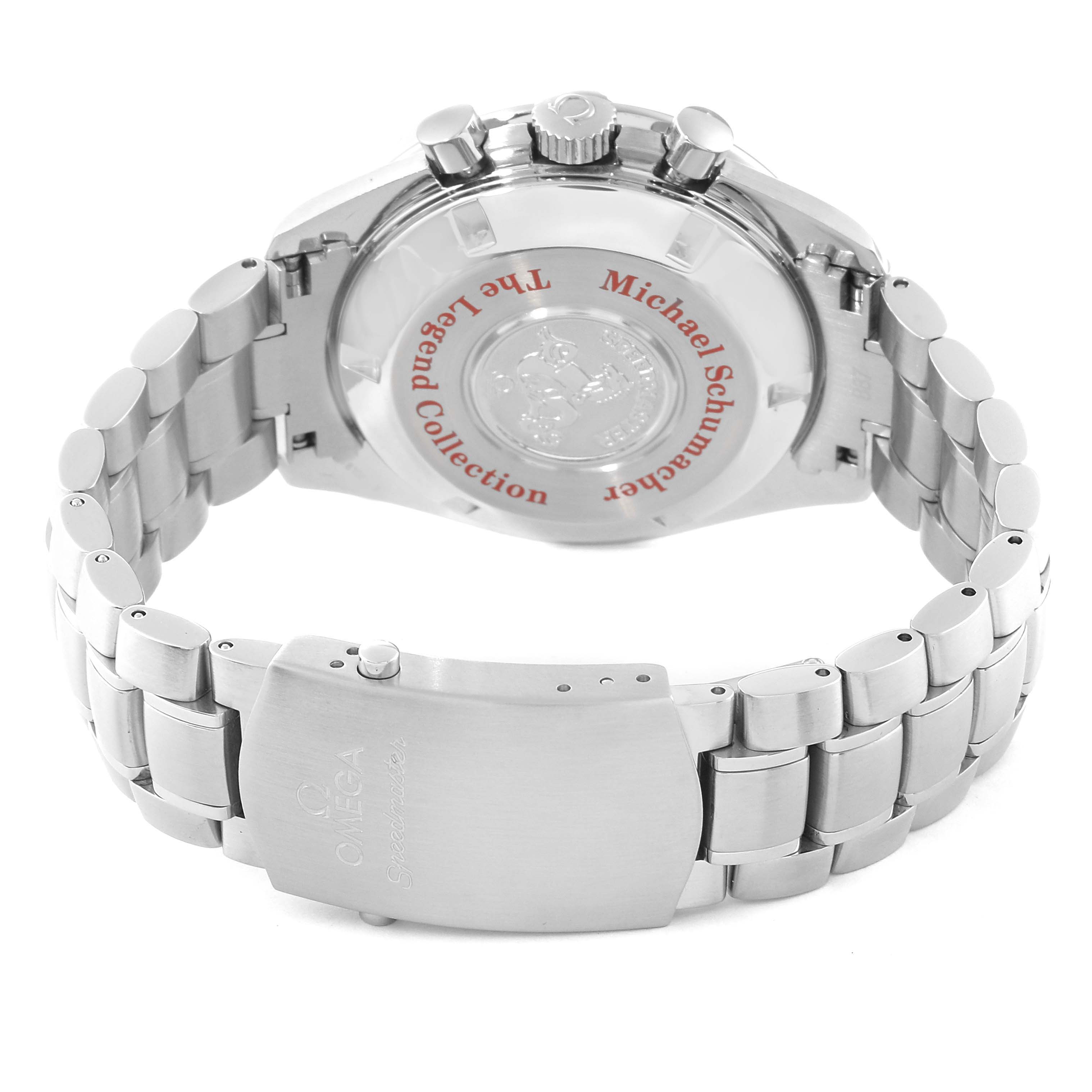This image shows the back and clasp of an Omega Speedmaster 3506.61.00 Men
s Stainless Steel Red Dial 3506.61.00 Men
s Stainless Steel Red Dial, highlighting the metal bracelet and the engraved case back.