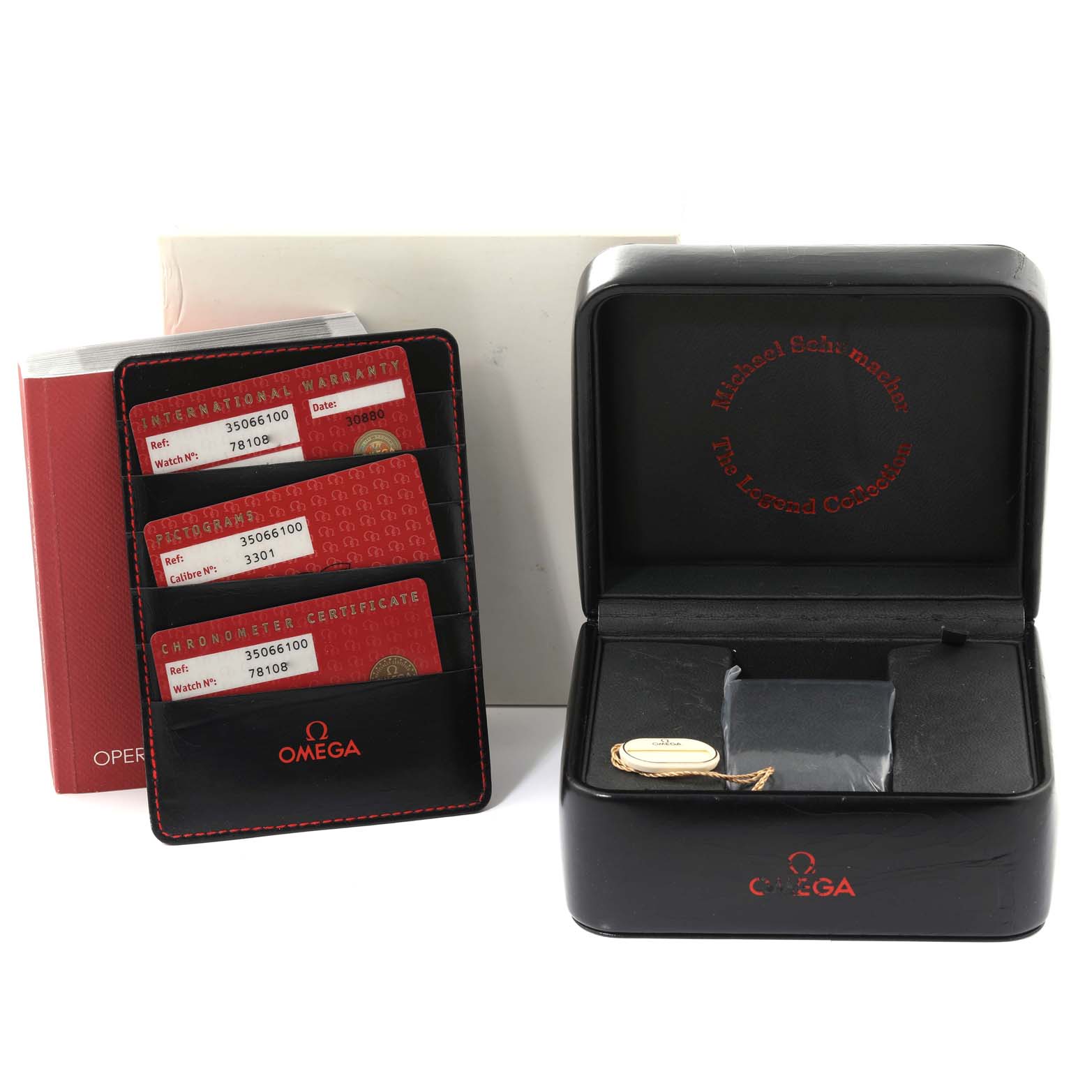 The image shows the Omega Speedmaster 3506.61.00 Men
s Stainless Steel Red Dial 3506.61.00 Men
s Stainless Steel Red Dial watch
s accessories, including a box, warranty cards, and operation manuals.