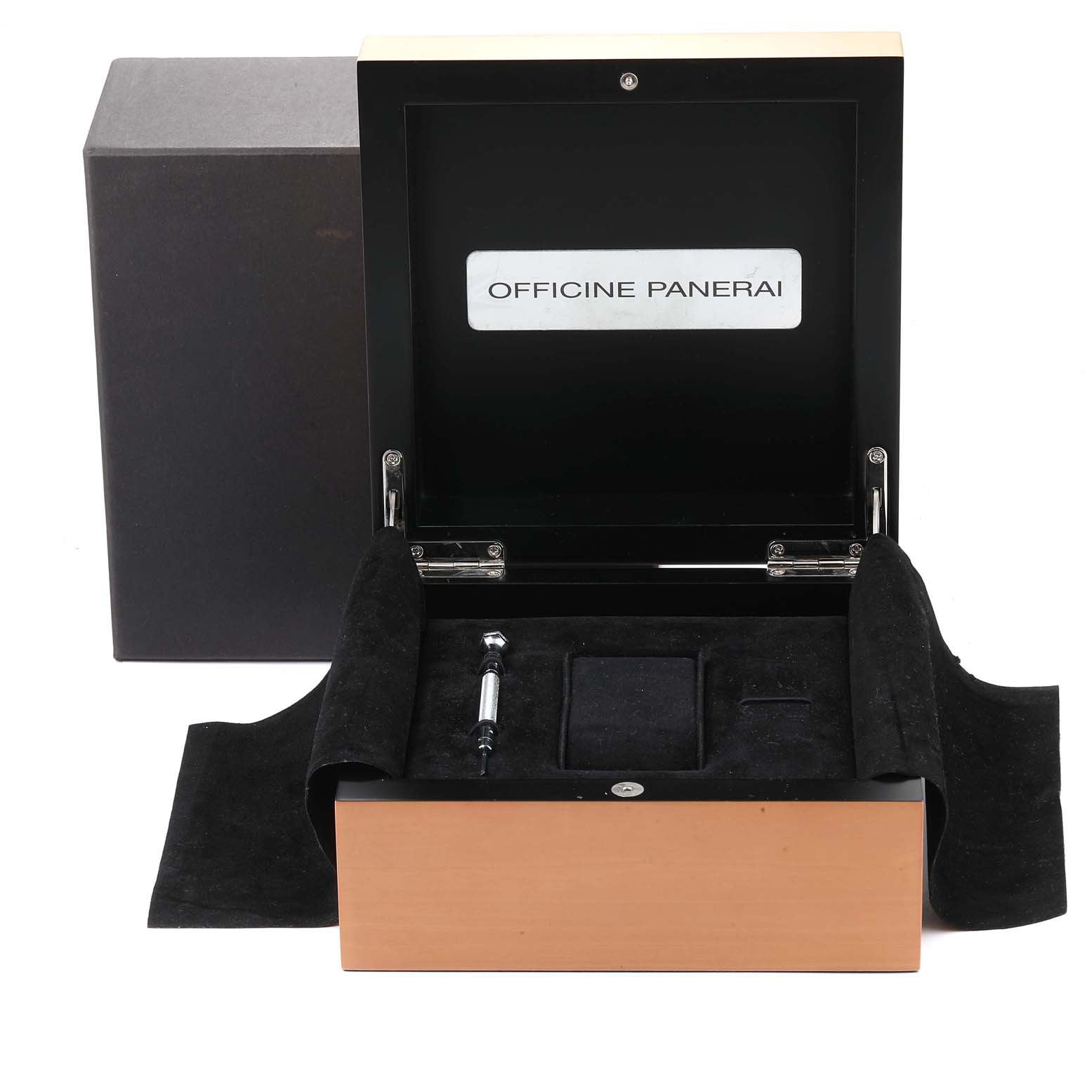 This image shows an open Panerai Luminor PAM00088 Men
s Stainless Steel Black Dial PAM00088 Men
s Stainless Steel Black Dial watch box, displaying compartments and a tool inside.