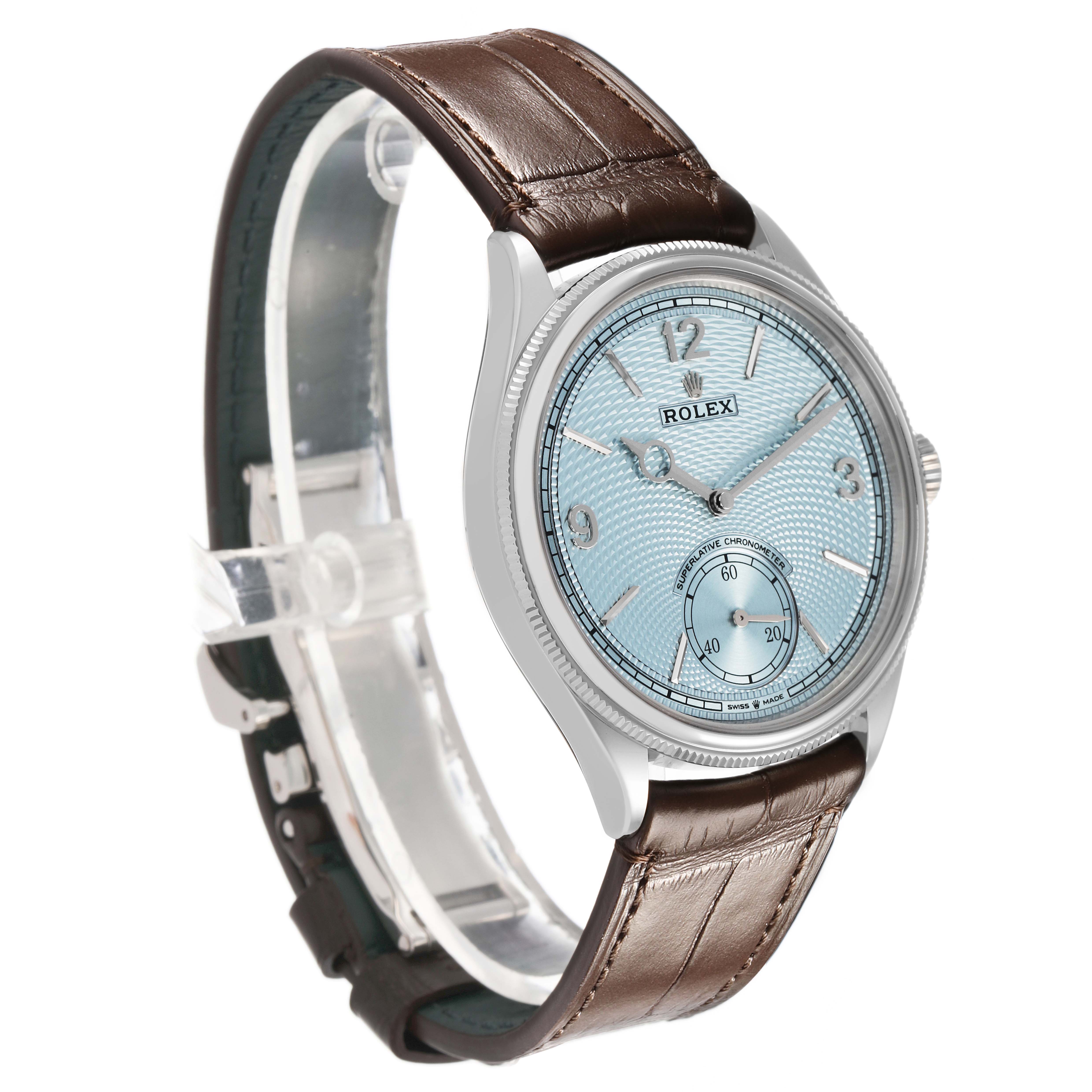 The image shows a Rolex 1908 52506 Men's Platinum Blue Dial model watch at a three-quarter angle, highlighting the dial, case, and brown leather strap.