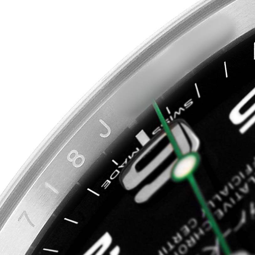 The image shows a close-up of the Rolex Air-King M116900-0001 Men's Stainless Steel Black Dial watch dial, displaying numerals and a green seconds hand.