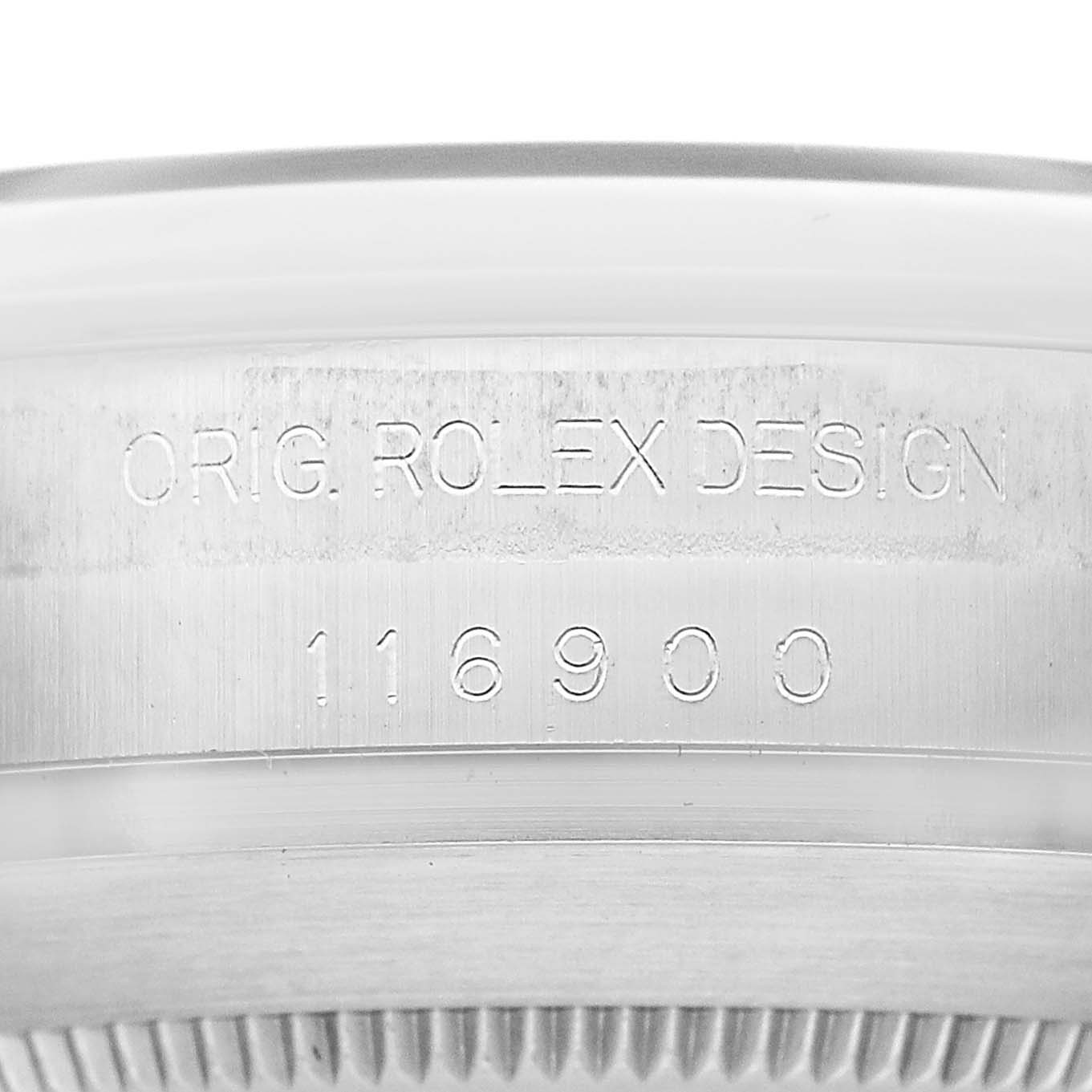 The image shows the side of a Rolex Air-King M116900-0001 Men's Stainless Steel Black Dial watch, highlighting the engraved model number "116900" and "ORIG. ROLEX DESIGN."