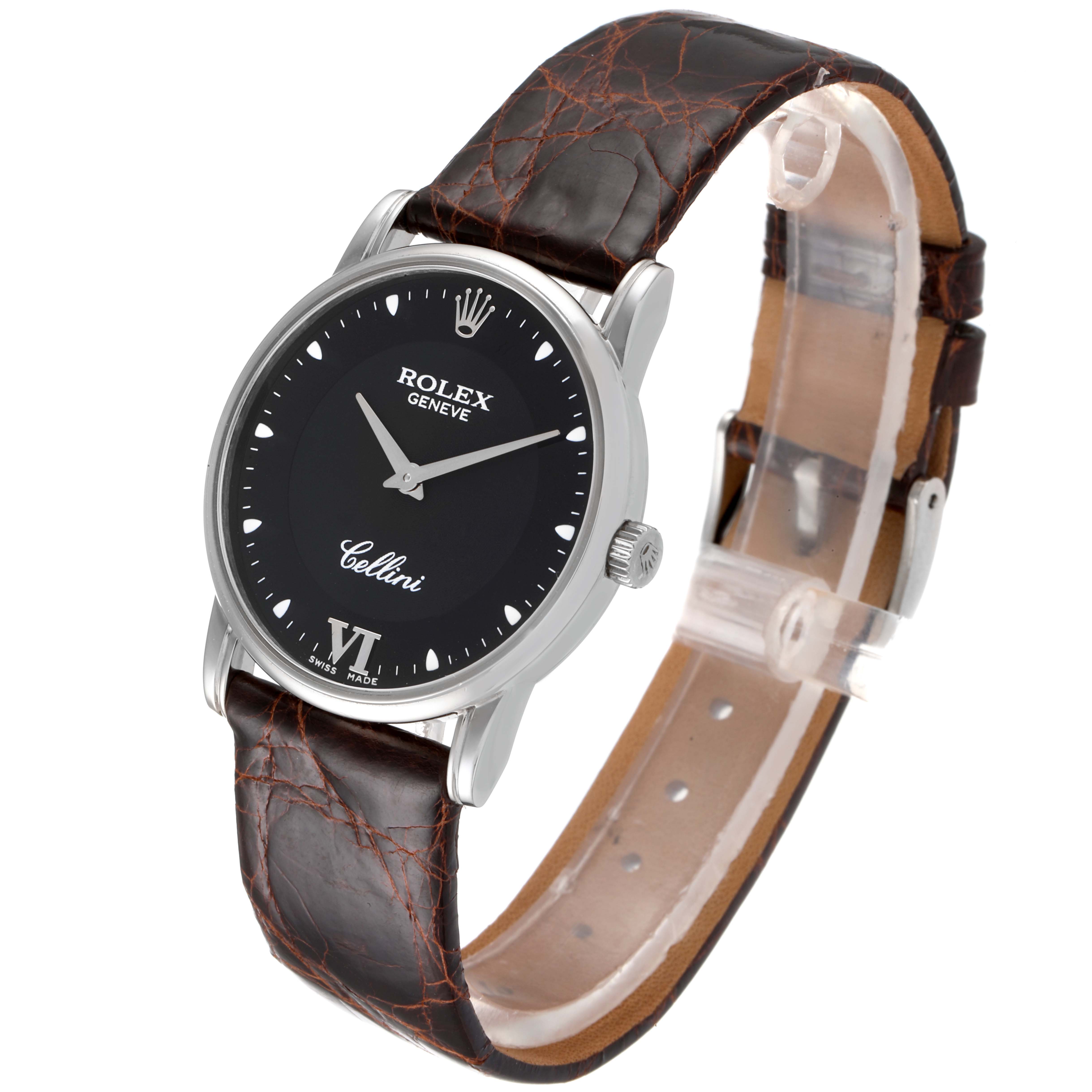 The image shows a Rolex Cellini 5116 Men's White Gold Black Dial 5116 Men's White Gold Black Dial watch at a three-quarter angle, highlighting its dial, case, crown, and leather strap.