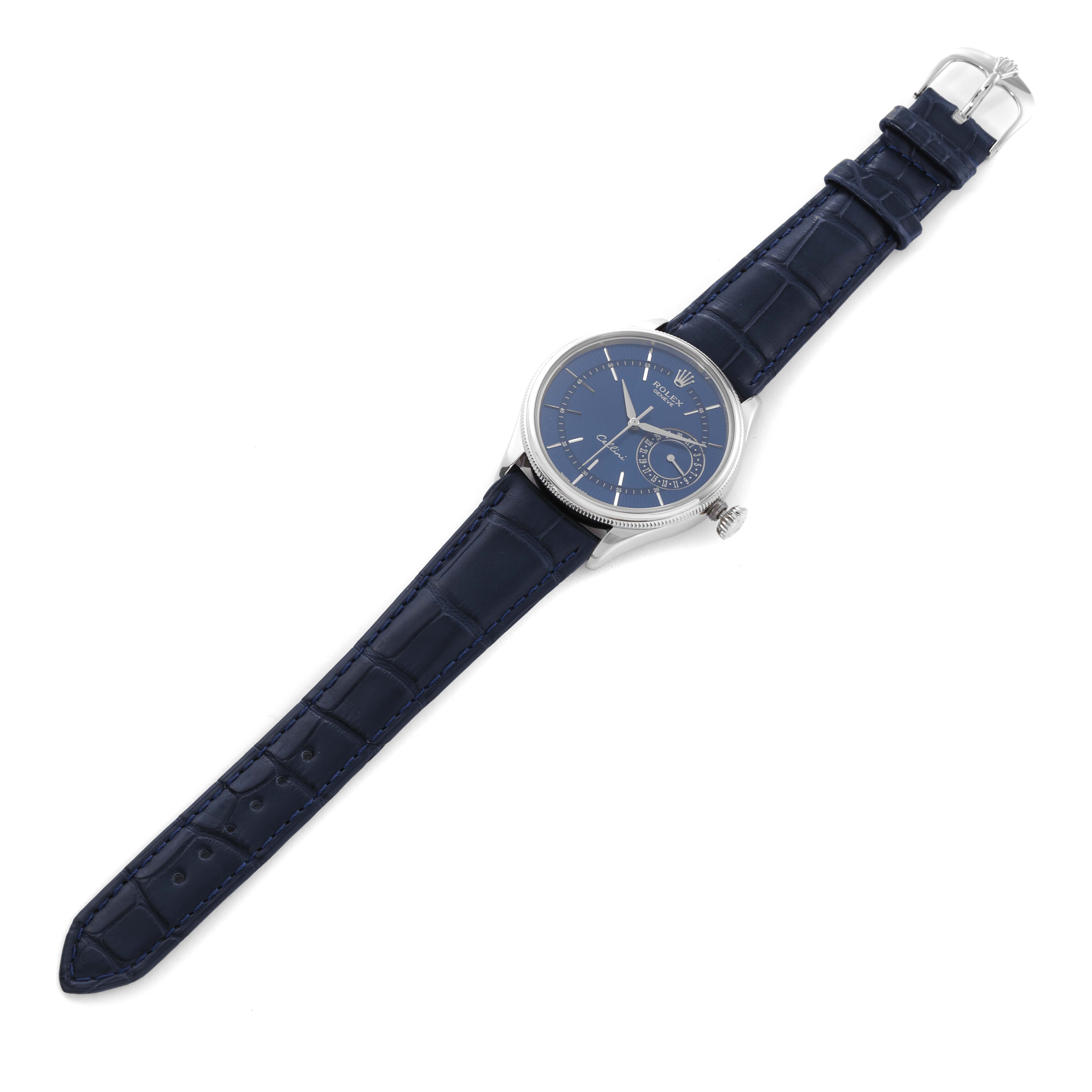 The Rolex Cellini 50519 Men
s White Gold Blue Dial 50519 Men
s White Gold Blue Dial watch in this image is shown from a top view, displaying its blue dial and strap.