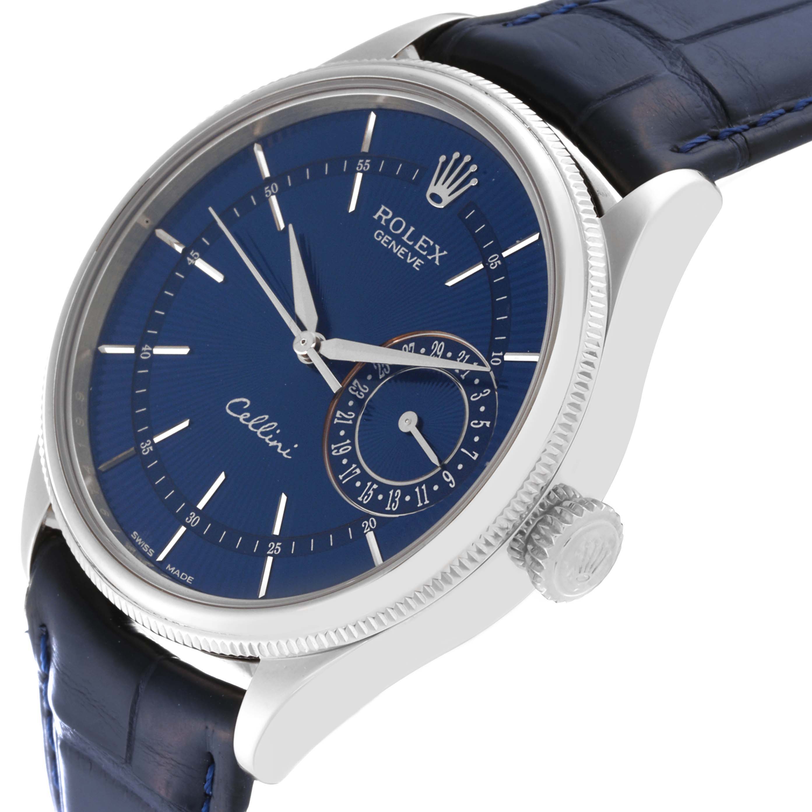The Rolex Cellini 50519 Men
s White Gold Blue Dial 50519 Men
s White Gold Blue Dial watch is shown from an angle highlighting the dial, crown, and part of the blue leather strap.