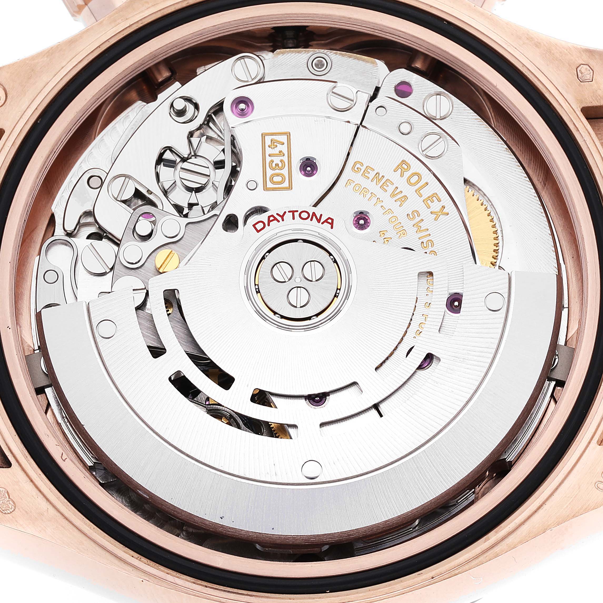 This image shows the intricate movement mechanism of a Rolex Daytona 116515LN Men's Rose Gold Black Dial 116515LN Men's Rose Gold Black Dial watch from an inside angle, revealing the brand and model details.