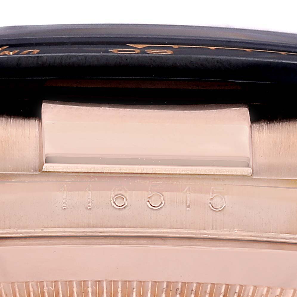 This close-up image shows the side of the Rolex Daytona 116515LN Men's Rose Gold Black Dial 116515LN Men's Rose Gold Black Dial model watch, detailing the lug and part of the case with a visible serial number.