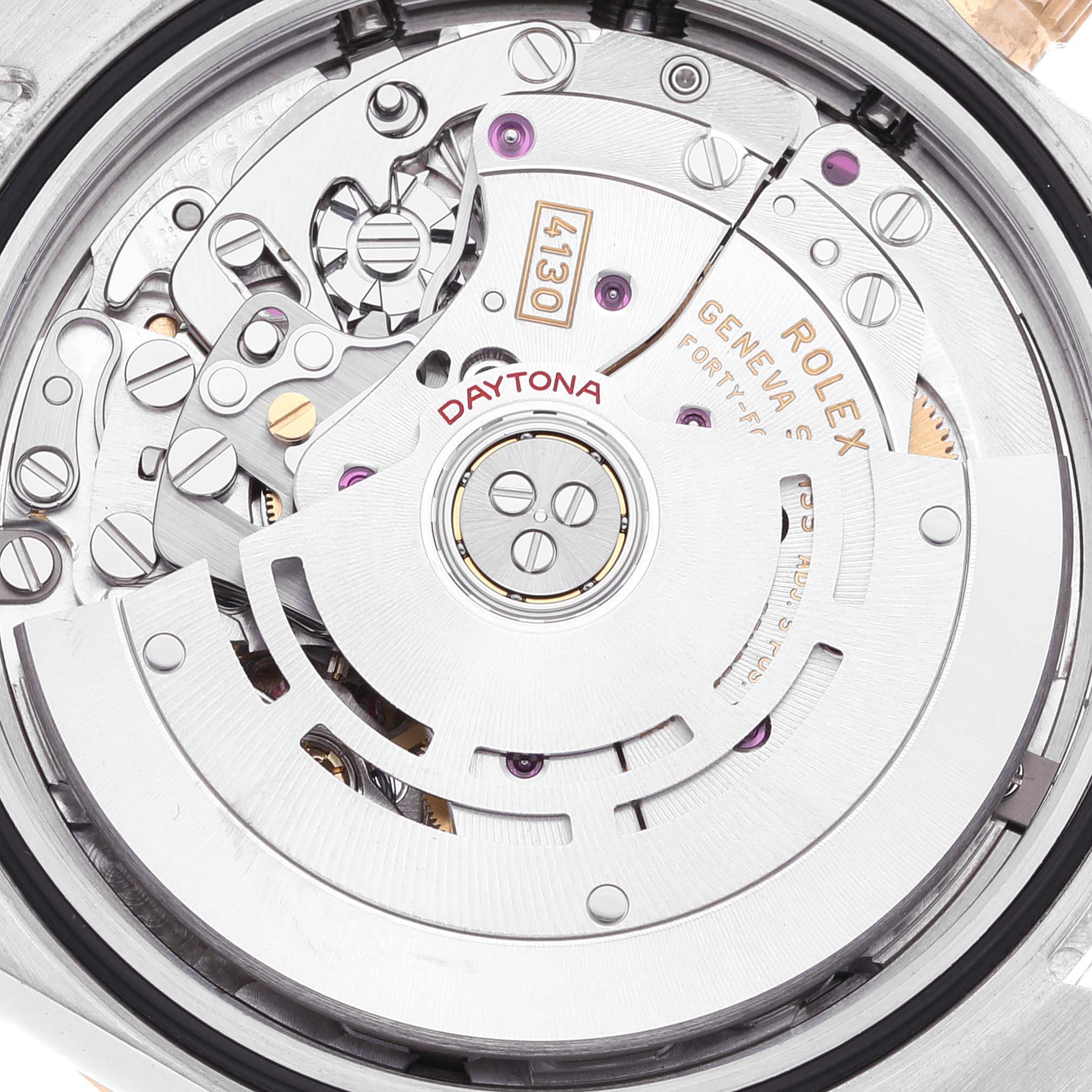 Close-up of the Rolex Daytona 116503 Men's Steel and Gold (two tone) Champagne Dial 116503 Men's Steel and Gold (two tone) Champagne Dial watch's movement and inner mechanics, showing intricate components and engravings.