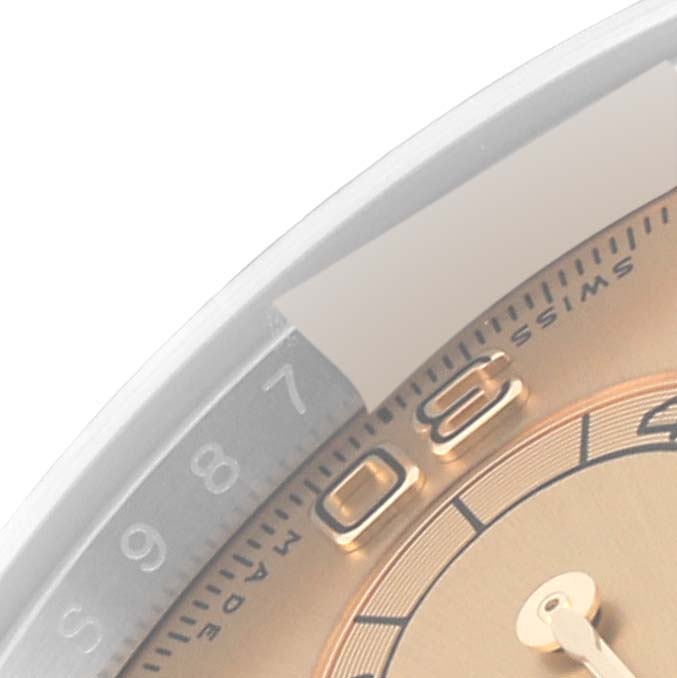 The image shows a close-up of the bezel and part of the dial of a Rolex Daytona 116503 Men's Steel and Gold (two tone) Champagne Dial 116503 Men's Steel and Gold (two tone) Champagne Dial watch, focusing on the numeral '60'.