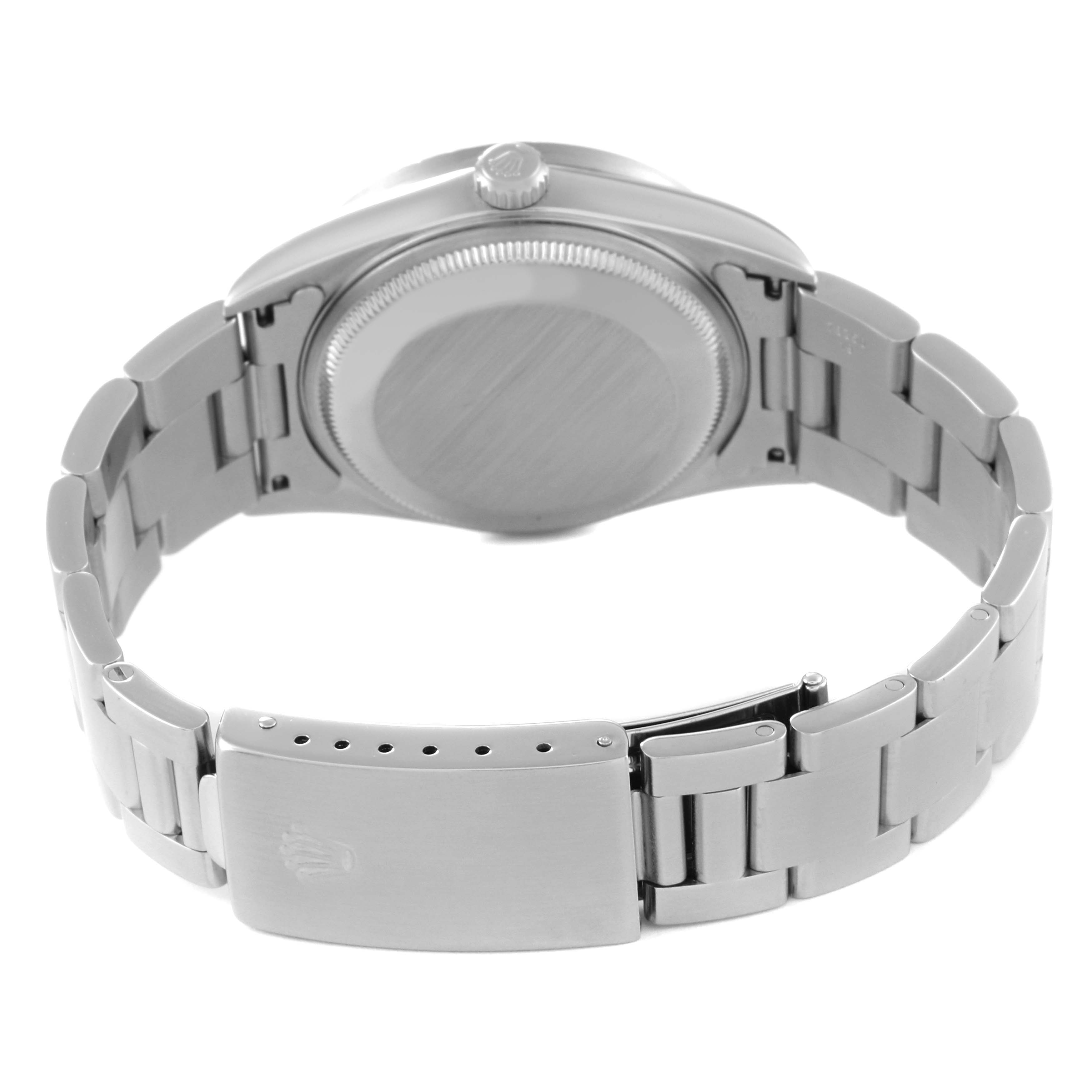 The image displays the back view of a Rolex Date 15210 Men's Stainless Steel Black Dial 15210 Men's Stainless Steel Black Dial watch, showing the case back, bracelet, and clasp.