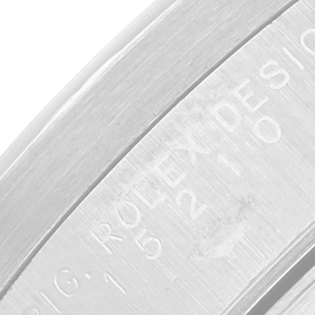 The image shows a close-up of the inner bezel ring with engravings of the Rolex Date 15210 Men's Stainless Steel Black Dial 15210 Men's Stainless Steel Black Dial watch model.