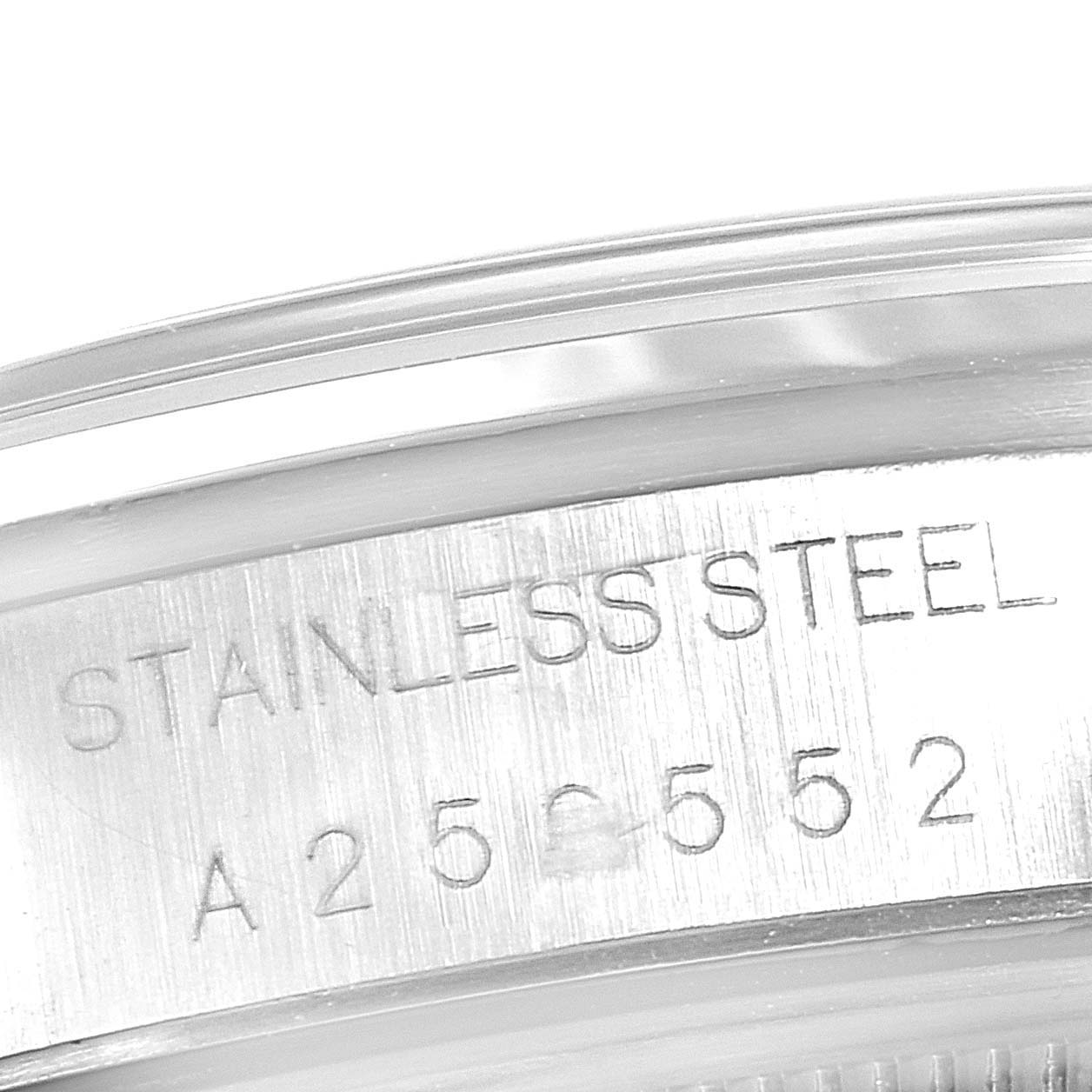This image shows a close-up of the stainless steel case back with engraved serial number of a Rolex Datejust 15200 Men's Stainless Steel Silver Dial 15200 Men's Stainless Steel Silver Dial watch.