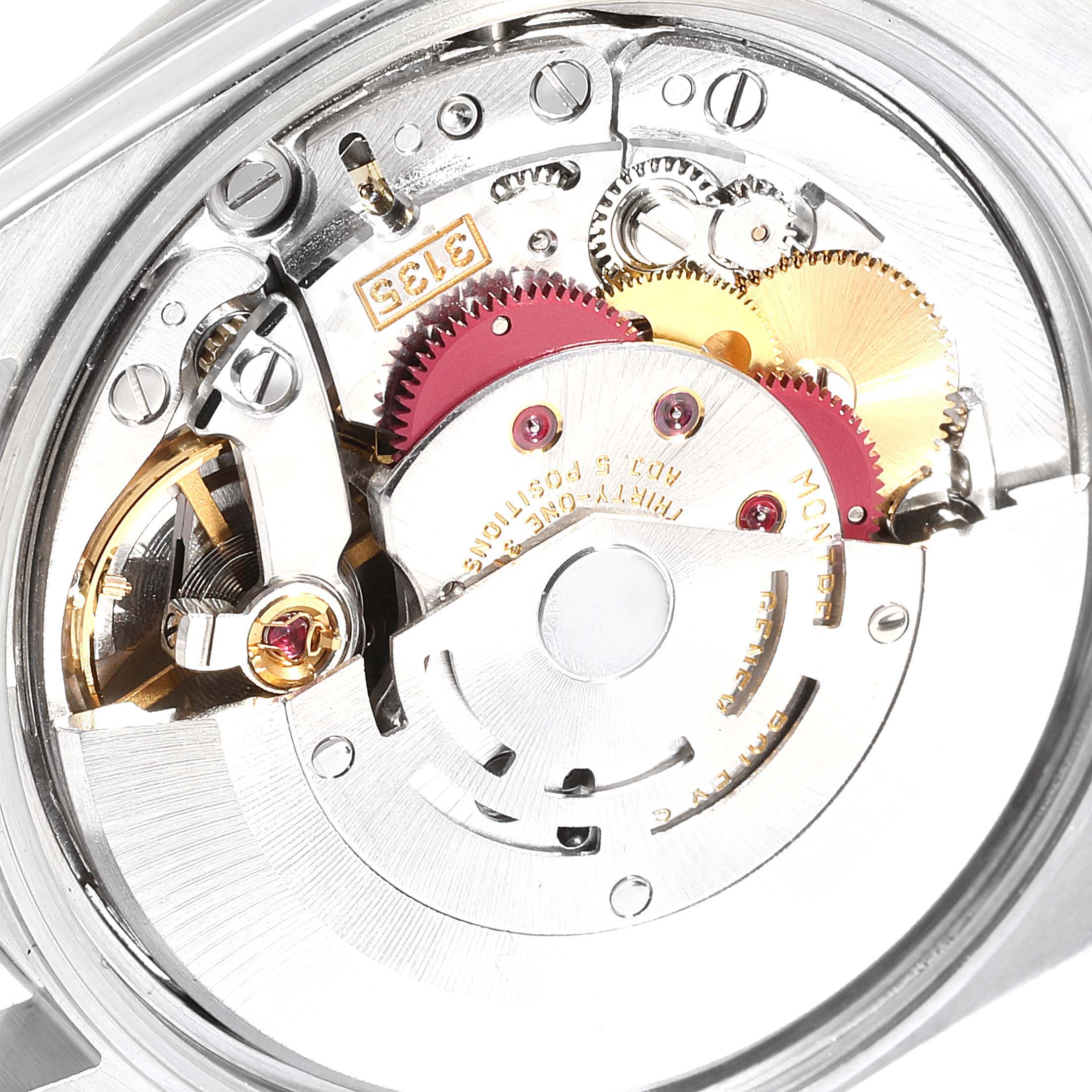 This image shows a close-up view of the intricately detailed movement inside a Rolex Datejust 15200 Men's Stainless Steel Silver Dial 15200 Men's Stainless Steel Silver Dial watch.