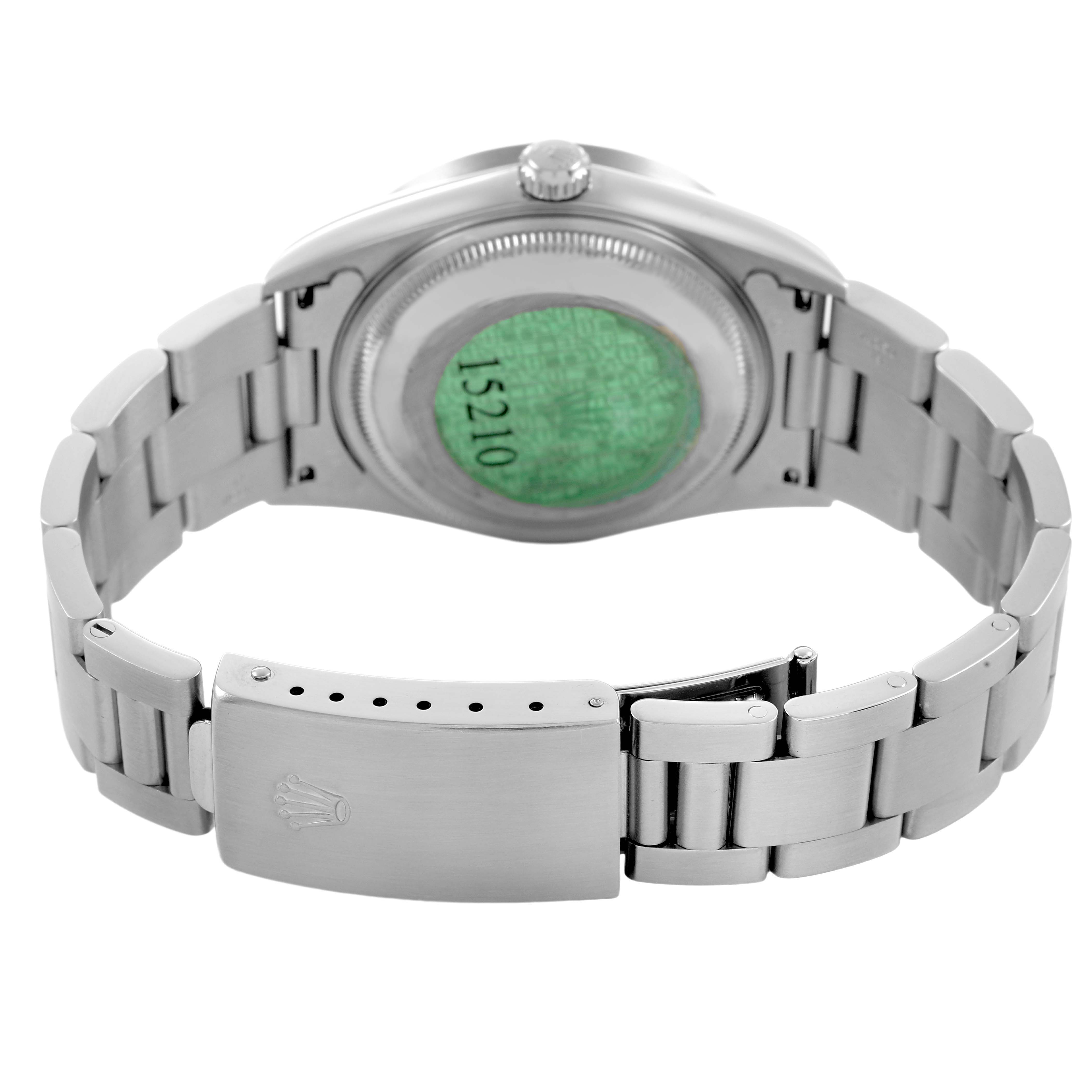 The image shows the back of a Rolex Date 15210 Men's Stainless Steel Black Dial watch, focusing on the bracelet, clasp, and case back at an angle.