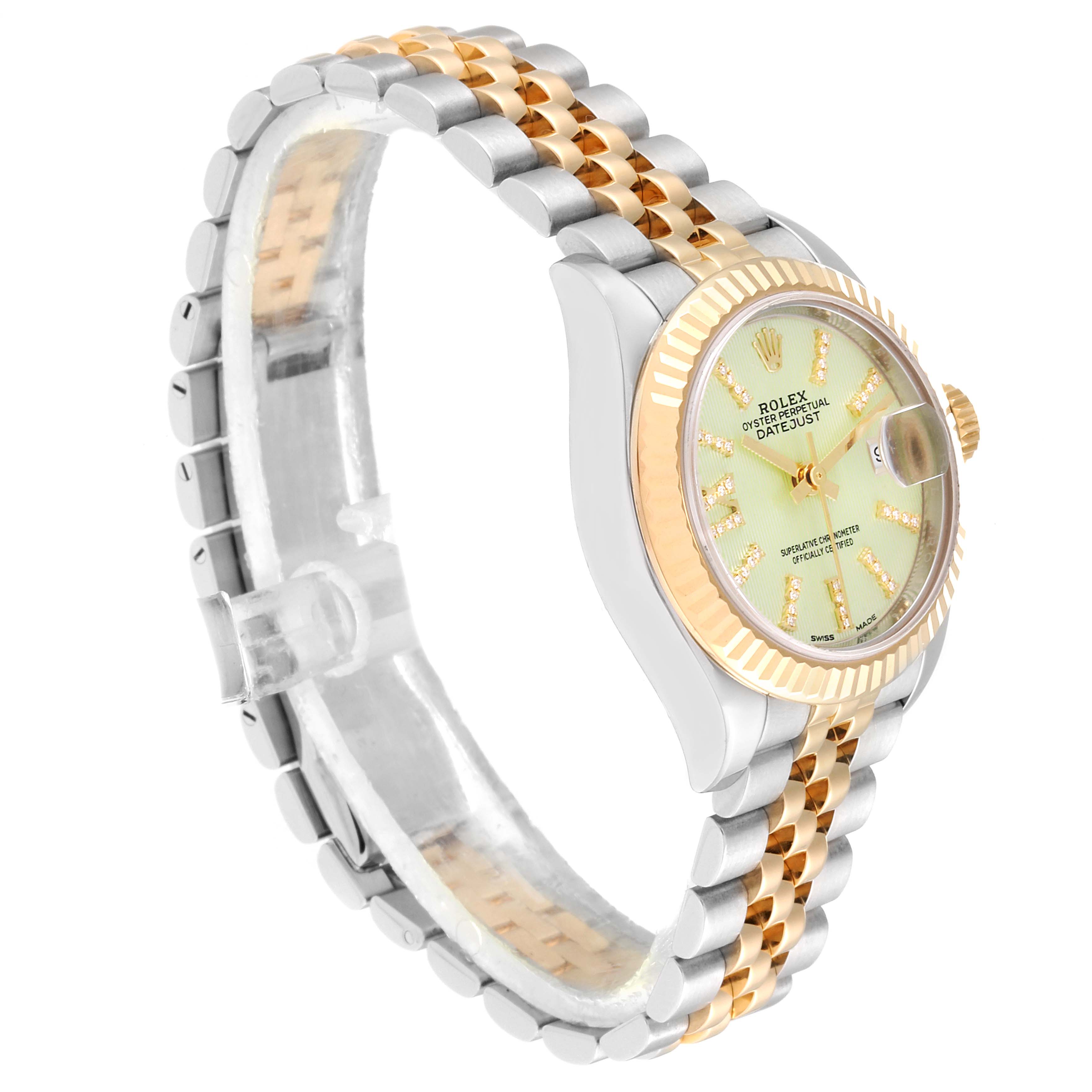 The image shows a side angle of a Rolex Datejust 279173 Women's Steel and Gold (two tone) Green Dial 279173 Women's Steel and Gold (two tone) Green Dial watch, highlighting its gold and silver Jubilee bracelet and fluted bezel.