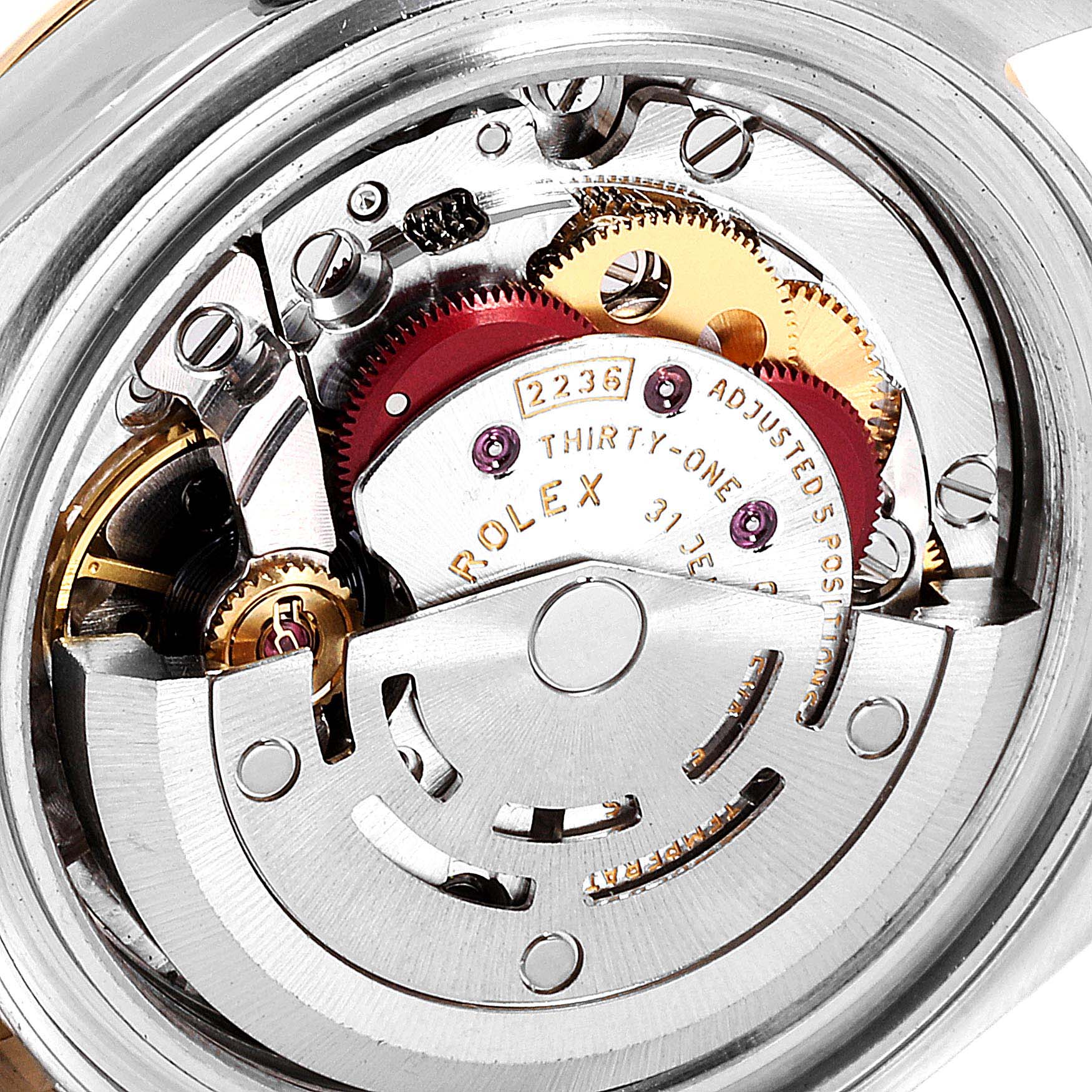 The image shows the internal movement of a Rolex Datejust 279173 Women's Steel and Gold (two tone) Green Dial 279173 Women's Steel and Gold (two tone) Green Dial watch, featuring gears, a rotor, and the inscribed details.