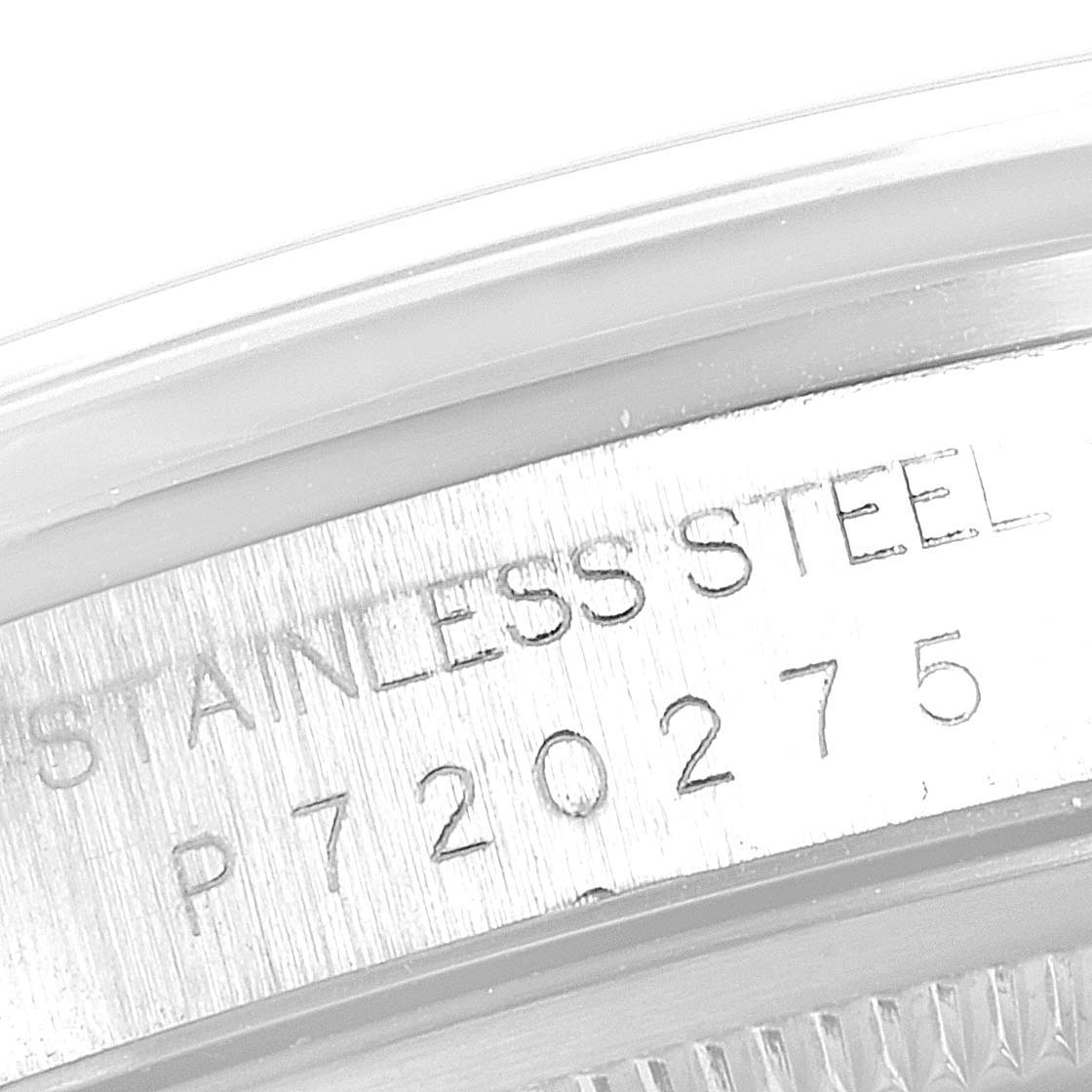 The image shows a close-up of the serial number and material markings on the side of a Rolex Datejust 16200 Men's Stainless Steel Silver Dial 16200 Men's Stainless Steel Silver Dial watch.