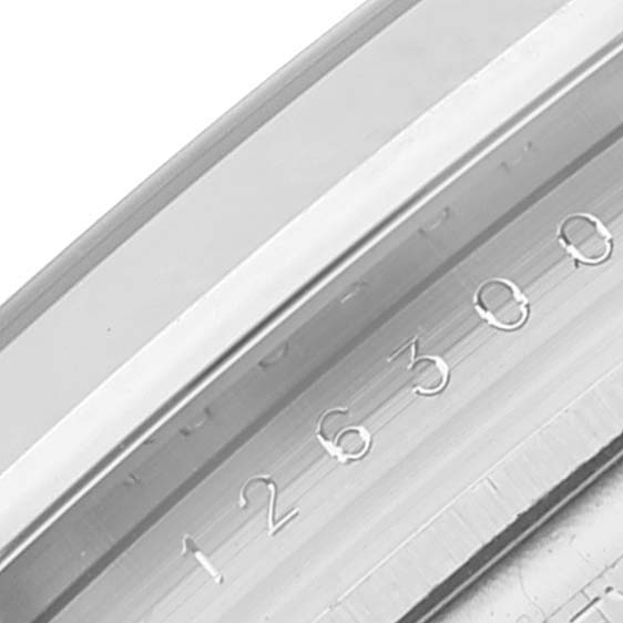 This close-up angle shows the reference number engraved on the case of the Rolex Datejust 41 126300 Men's Stainless Steel Green Dial 126300 Men's Stainless Steel Green Dial model.