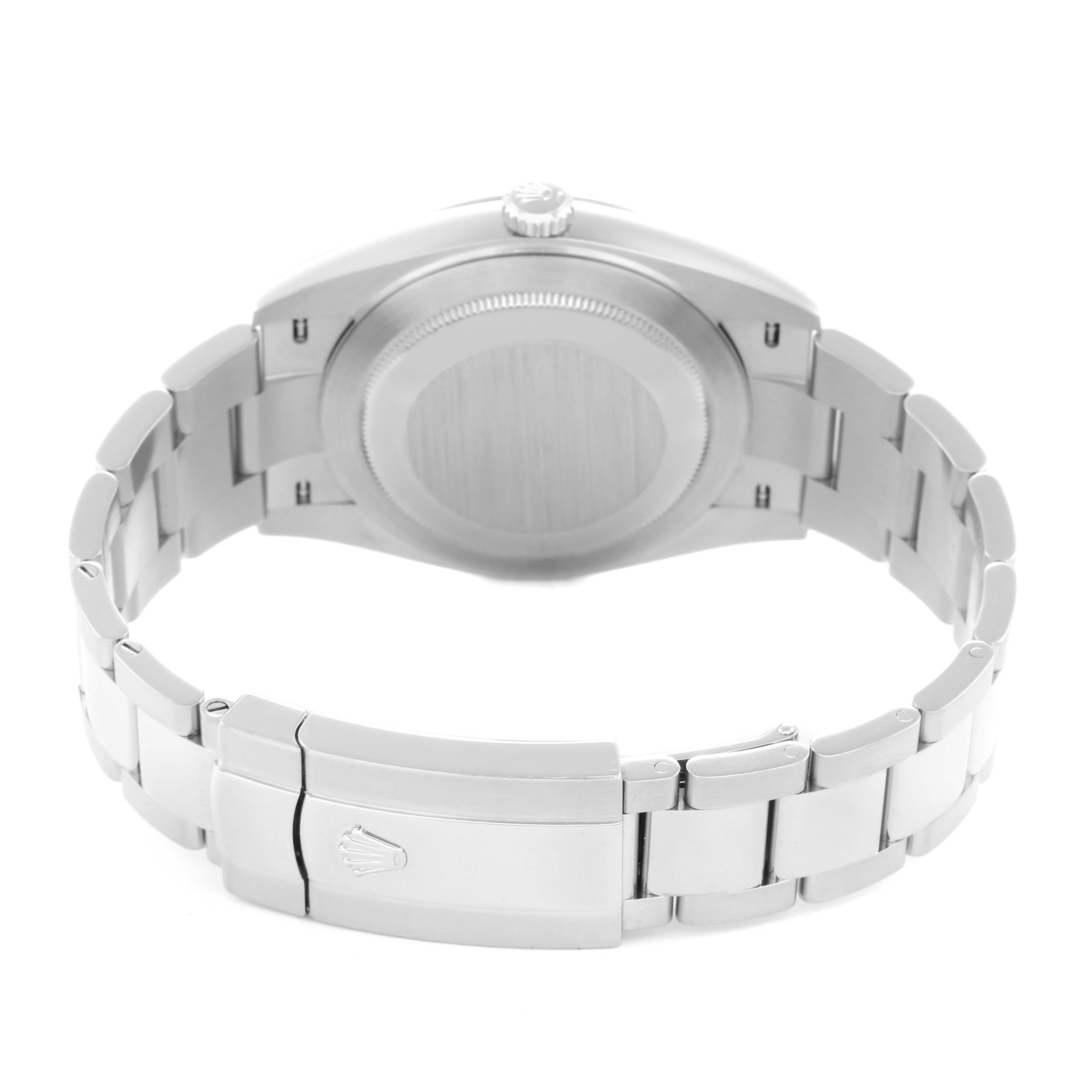 The image shows the back view of a Rolex Datejust, highlighting the case back and the Oyster bracelet with the clasp.