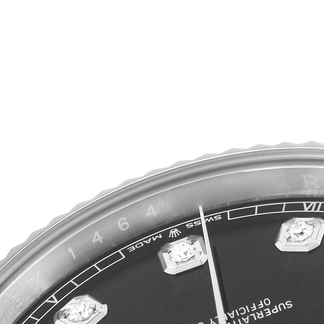 The image shows a close-up of the Rolex Datejust
s dial, focusing on the diamond hour markers and part of the fluted bezel.