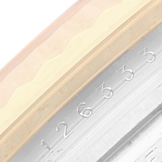 This image shows a close-up of the serial number engraving on the rehaut of a Rolex Datejust 41 126333 Men's Steel and Gold (two tone) Silver Dial 126333 Men's Steel and Gold (two tone) Silver Dial watch.