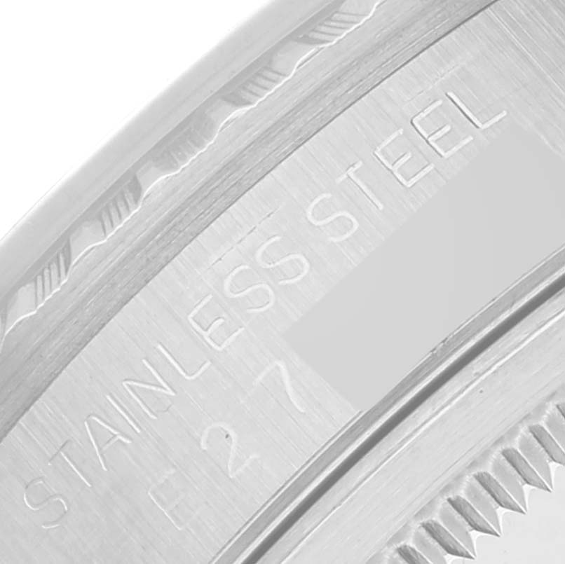 The image shows a close-up of the case back edge of a Rolex Datejust 16220 Men's Stainless Steel Blue Dial 16220 Men's Stainless Steel Blue Dial, displaying the "STAINLESS STEEL" engraving.