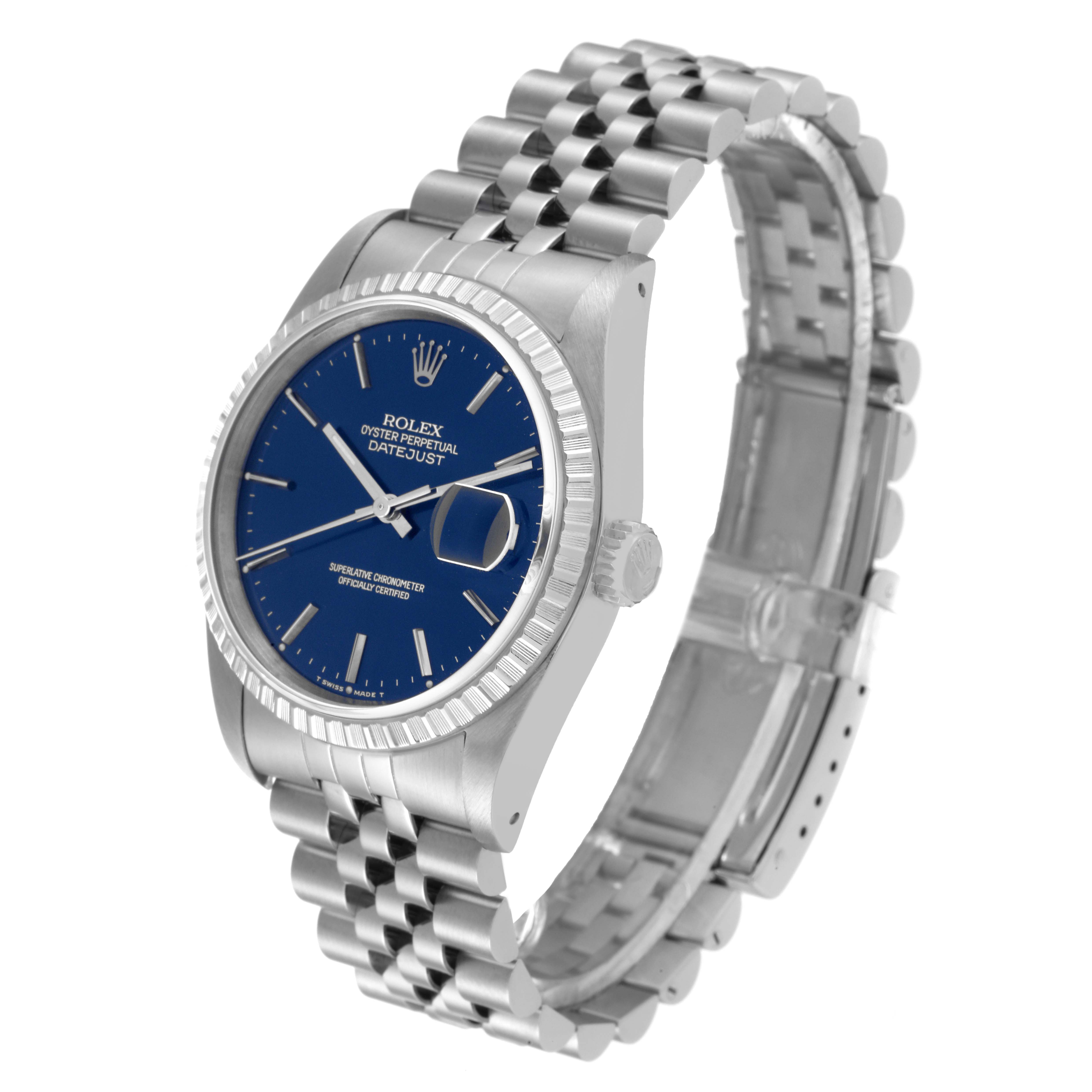The Rolex Datejust 16220 Men's Stainless Steel Blue Dial 16220 Men's Stainless Steel Blue Dial watch is shown at a three-quarter angle, displaying its face, bezel, and bracelet.
