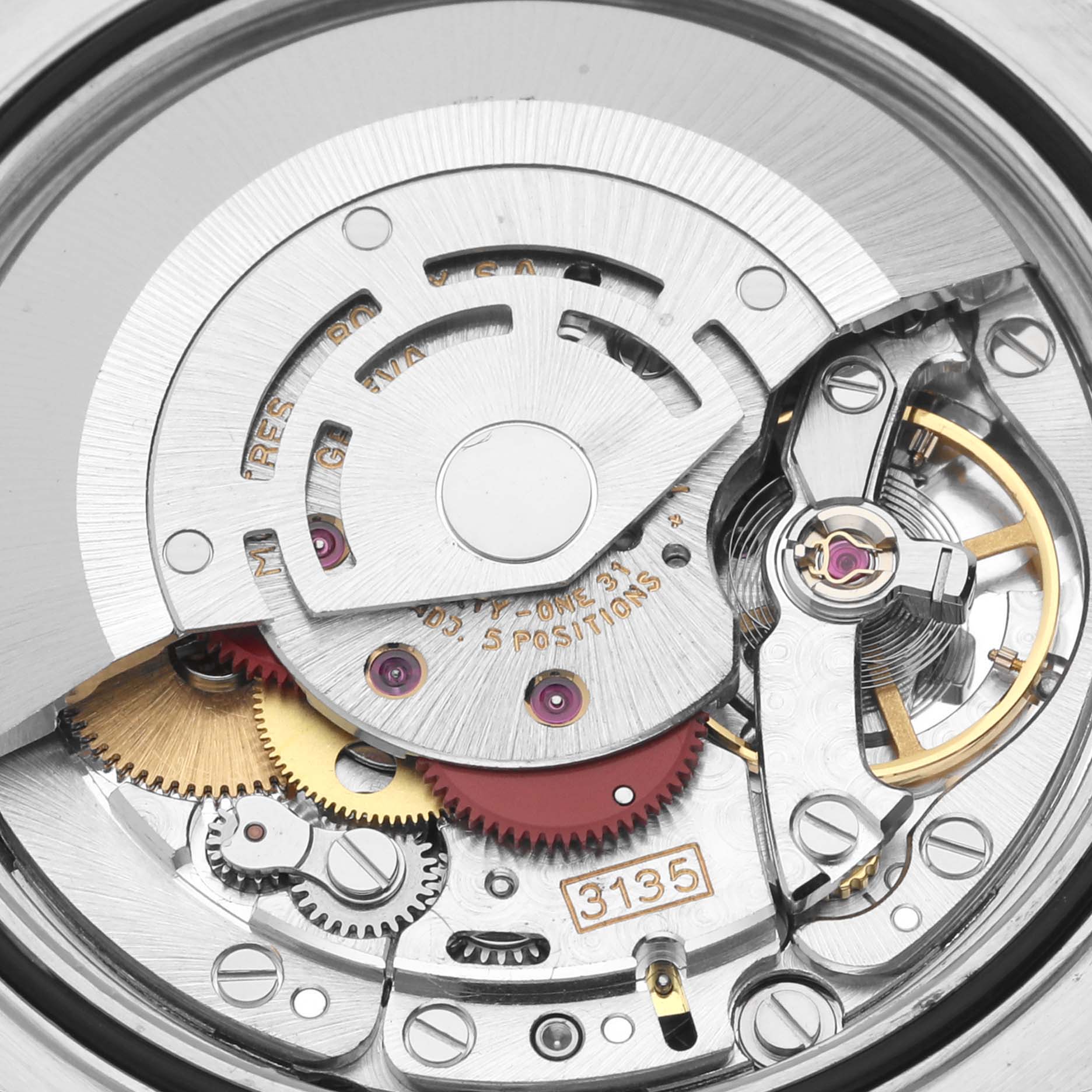 This image shows the movement of a Rolex Datejust 16233 Men's Steel and Gold (two tone) Champagne Dial 16233 Men's Steel and Gold (two tone) Champagne Dial, highlighting the automatic rotor, gears, and balance wheel.