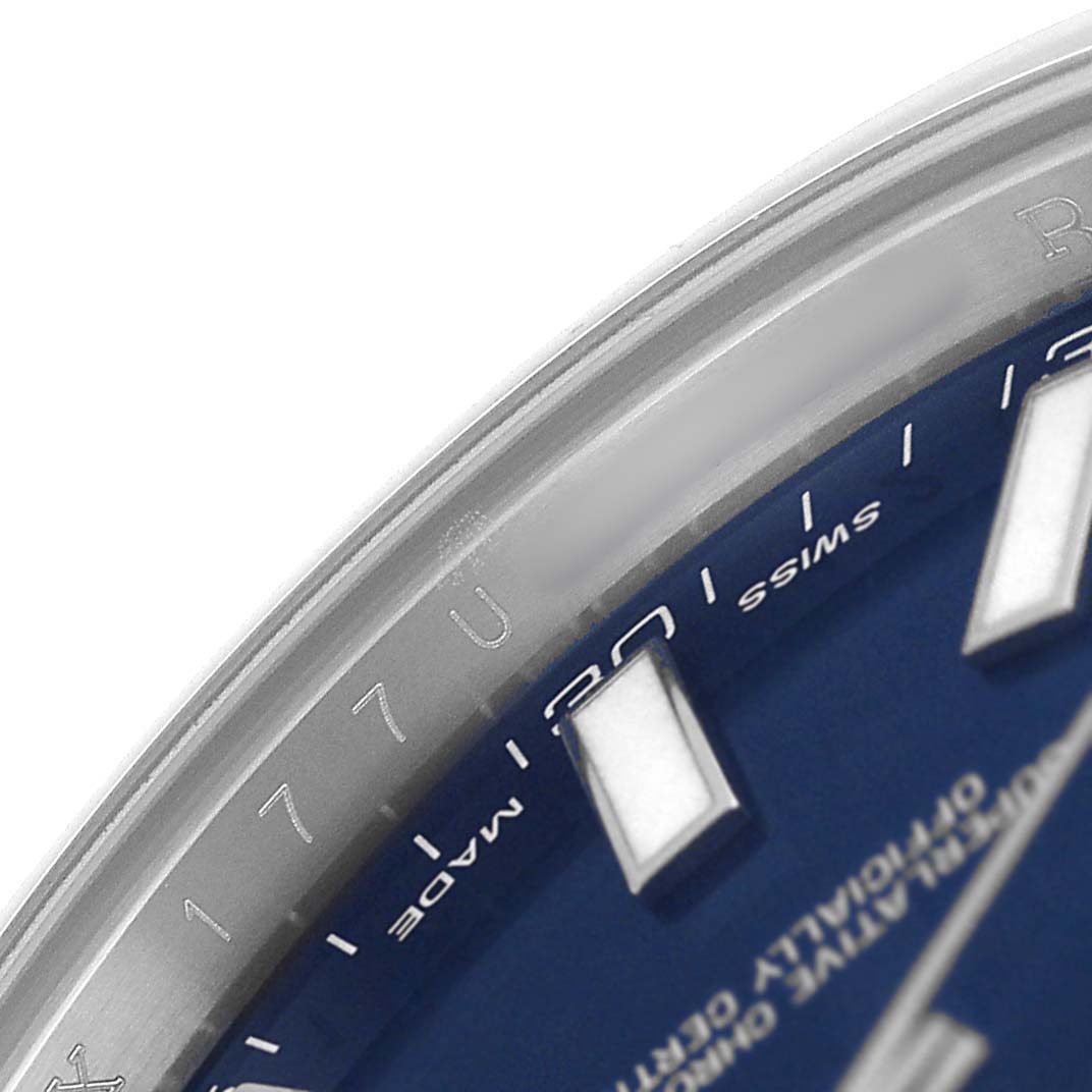 The image shows a close-up of the bezel and dial edge of a Rolex Datejust 41 116300 Men's Stainless Steel Blue Dial, highlighting the indices and part of the blue dial.