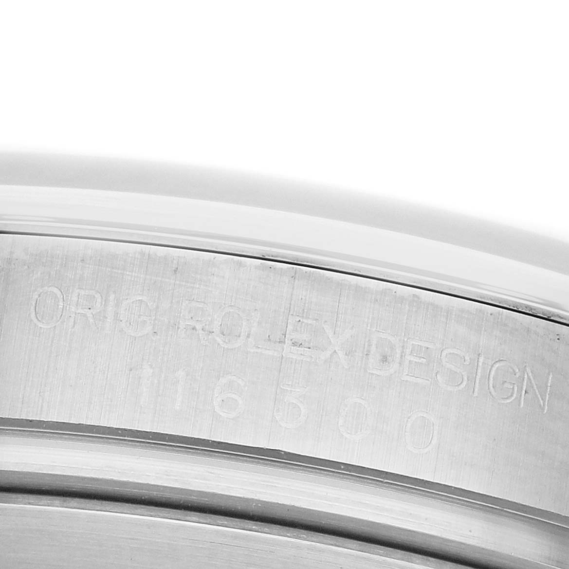 The image shows a close-up of the case side with engraved markings on the Rolex Datejust 41 116300 Men's Stainless Steel Grey Dial watch.