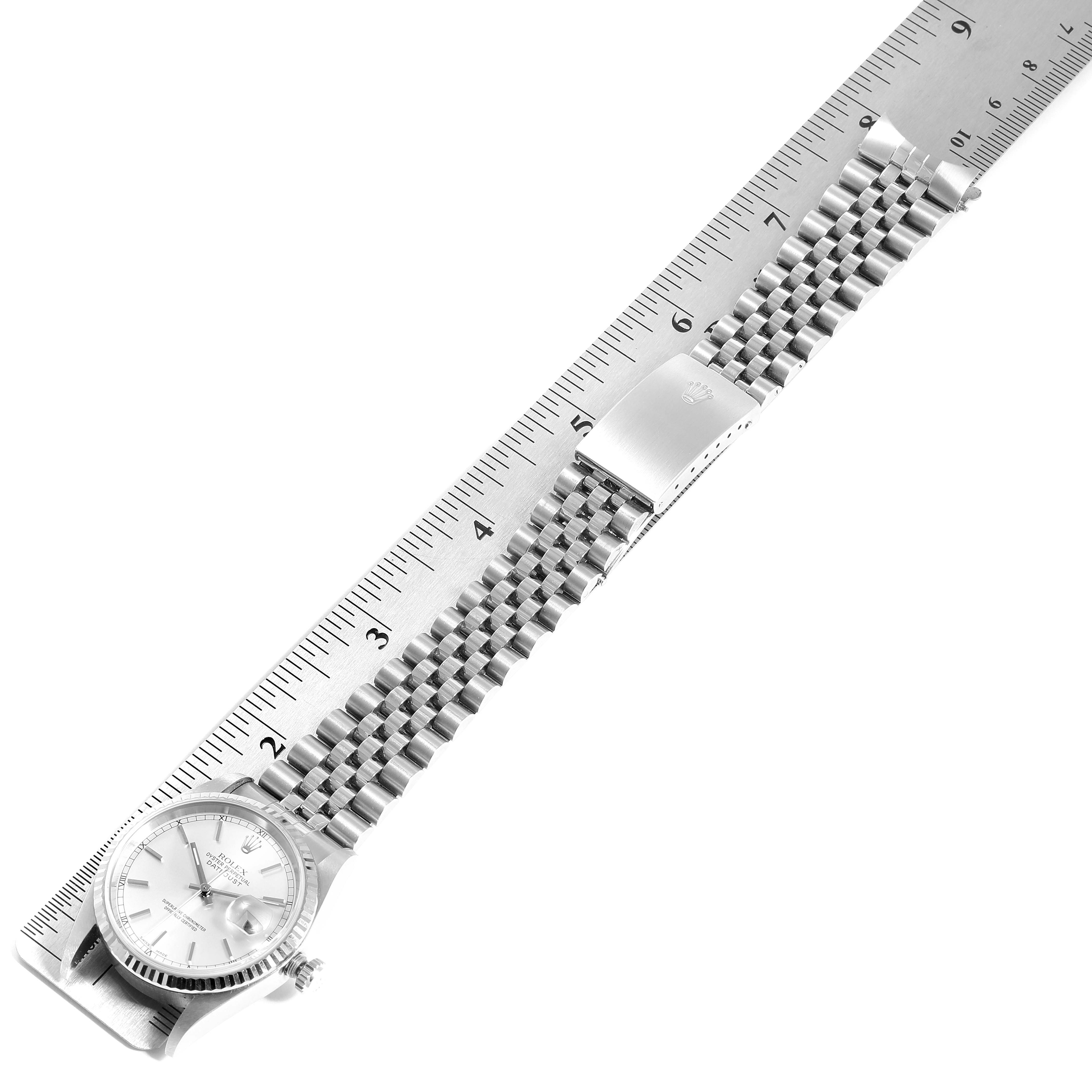 The image shows a Rolex Datejust 16234 Men's Stainless Steel Silver Dial 16234 Men's Stainless Steel Silver Dial watch laid flat with a ruler displaying its length and bracelet details.