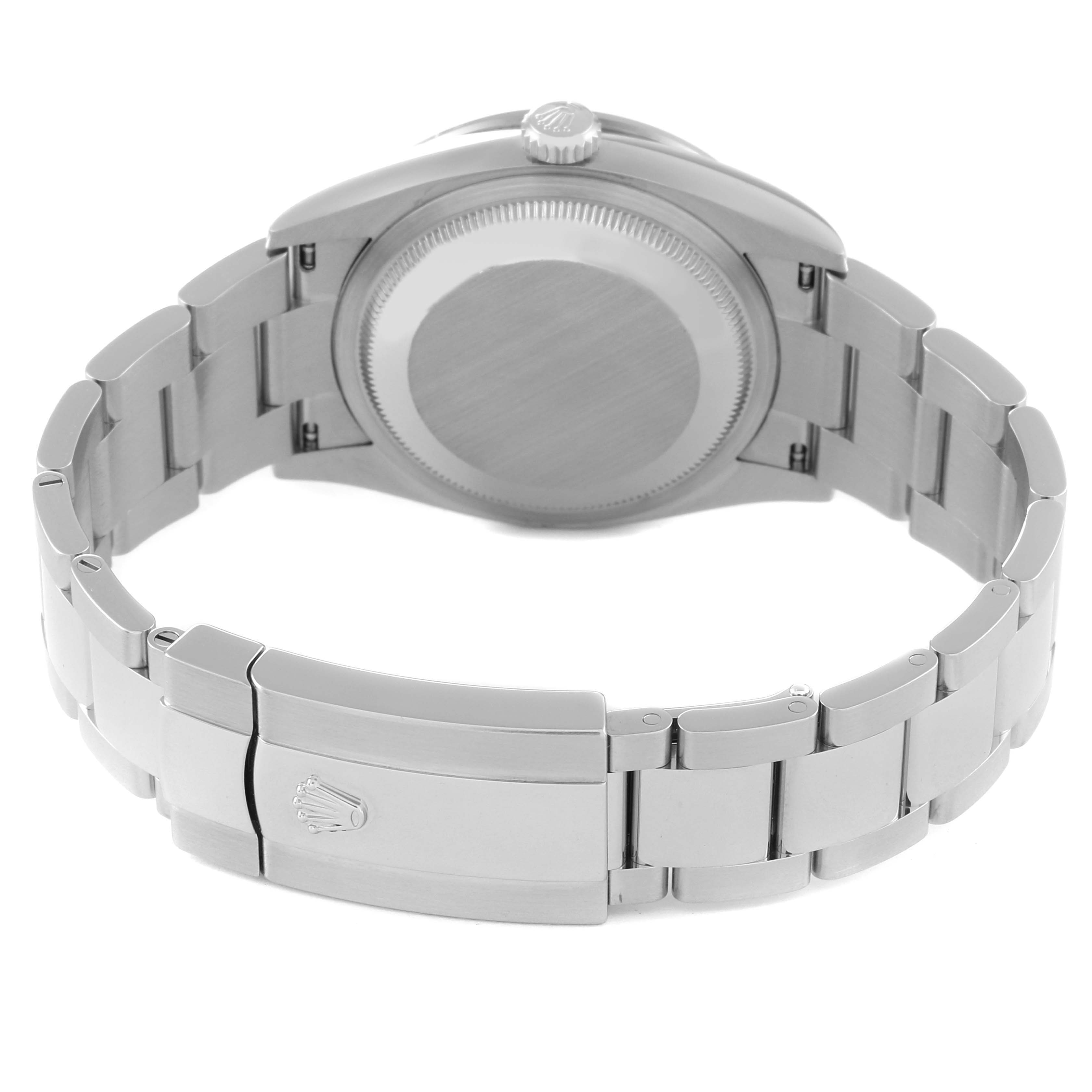 The image shows the back view of a Rolex Datejust 126284RBR Men's Stainless Steel Purple Dial 126284RBR Men's Stainless Steel Purple Dial watch, highlighting the clasp and metal bracelet.