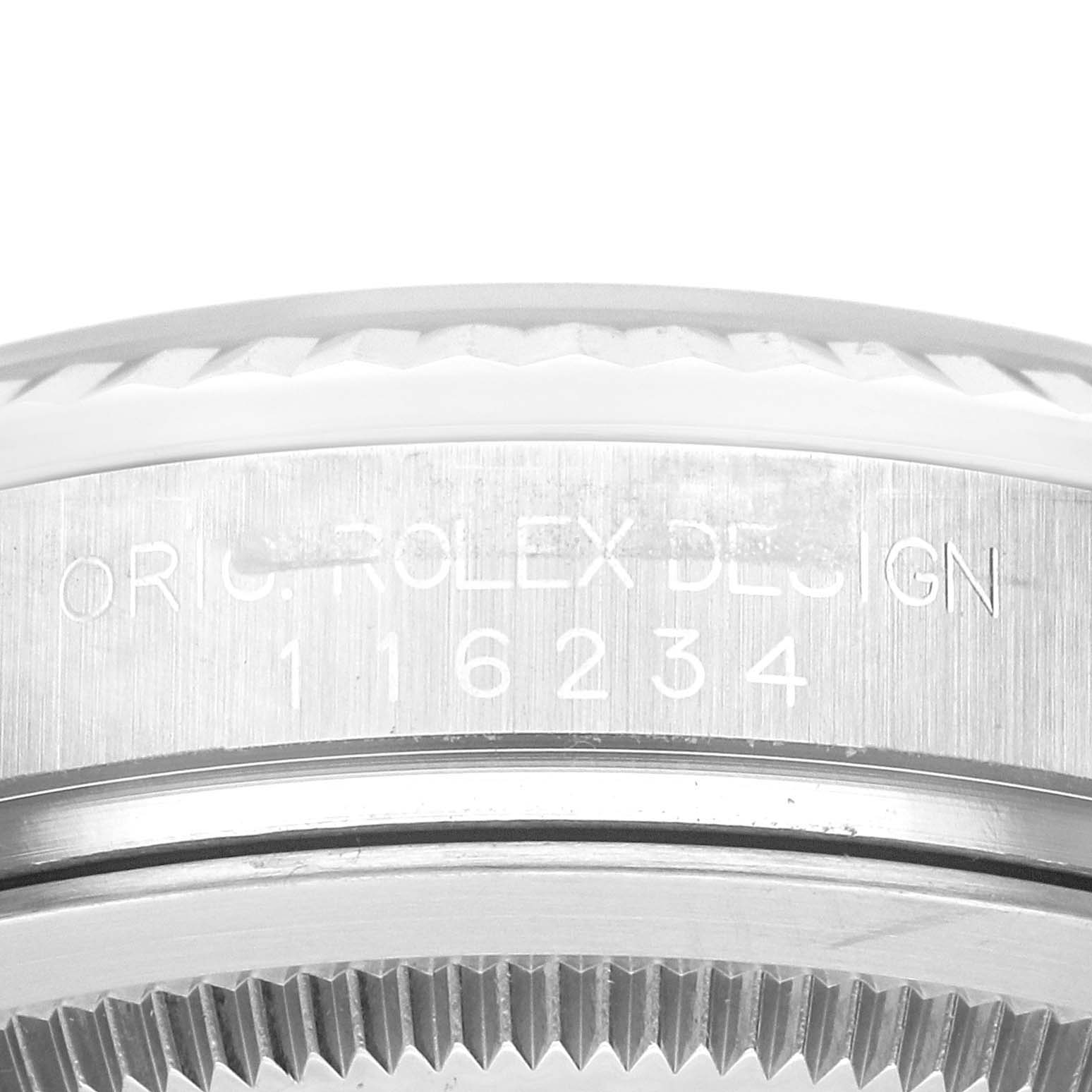 The image shows a close-up of the caseback edge and engraving of a Rolex Datejust 116234 Men's Stainless Steel White Dial 116234 Men's Stainless Steel White Dial watch model 116234.