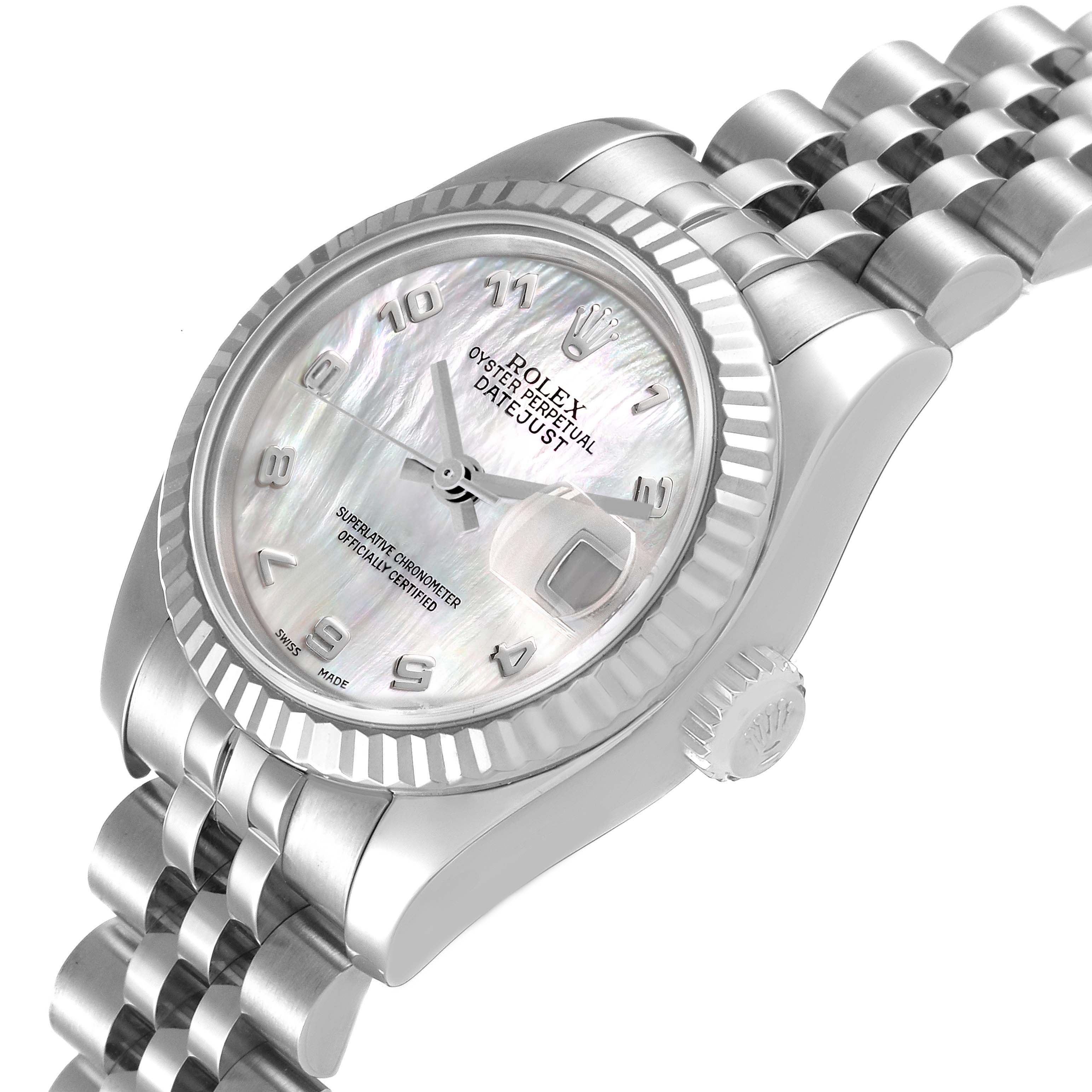The Rolex Datejust 179174 Women
s Stainless Steel Mother of Pearl Dial 179174 Women
s Stainless Steel Mother of Pearl Dial watch is shown in an angled view, highlighting the bezel, dial, crown, and part of the bracelet.
