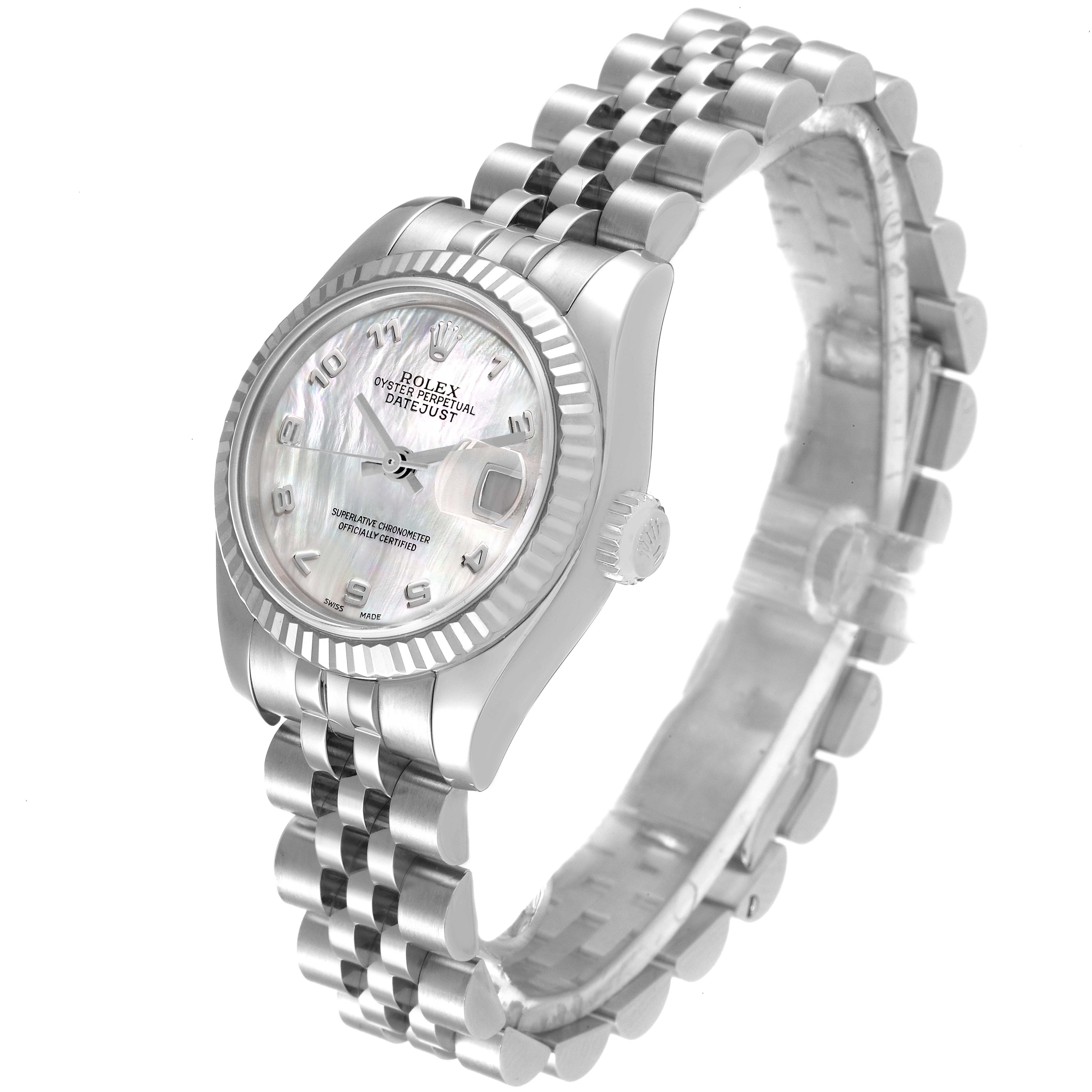 The Rolex Datejust 179174 Women
s Stainless Steel Mother of Pearl Dial 179174 Women
s Stainless Steel Mother of Pearl Dial watch is shown at an angle highlighting its face, bezel, and Jubilee bracelet.