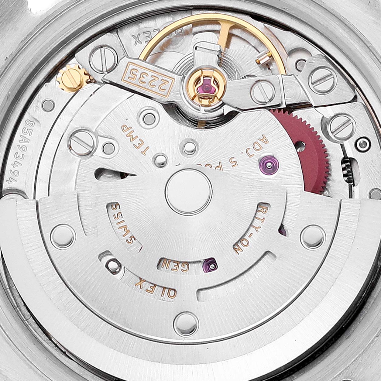 The image shows a close-up view of the movement parts inside a Rolex Datejust 179174 Women's Stainless Steel Pink Dial 179174 Women's Stainless Steel Pink Dial watch.