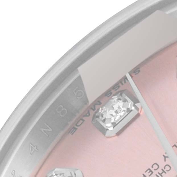 The image shows a close-up of the dial and diamond hour markers of a Rolex Datejust 179174 Women's Stainless Steel Pink Dial 179174 Women's Stainless Steel Pink Dial watch, viewed from an oblique angle.