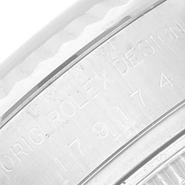 This close-up image shows the engraving on the case back of a Rolex Datejust 179174 Women's Stainless Steel Pink Dial 179174 Women's Stainless Steel Pink Dial watch.